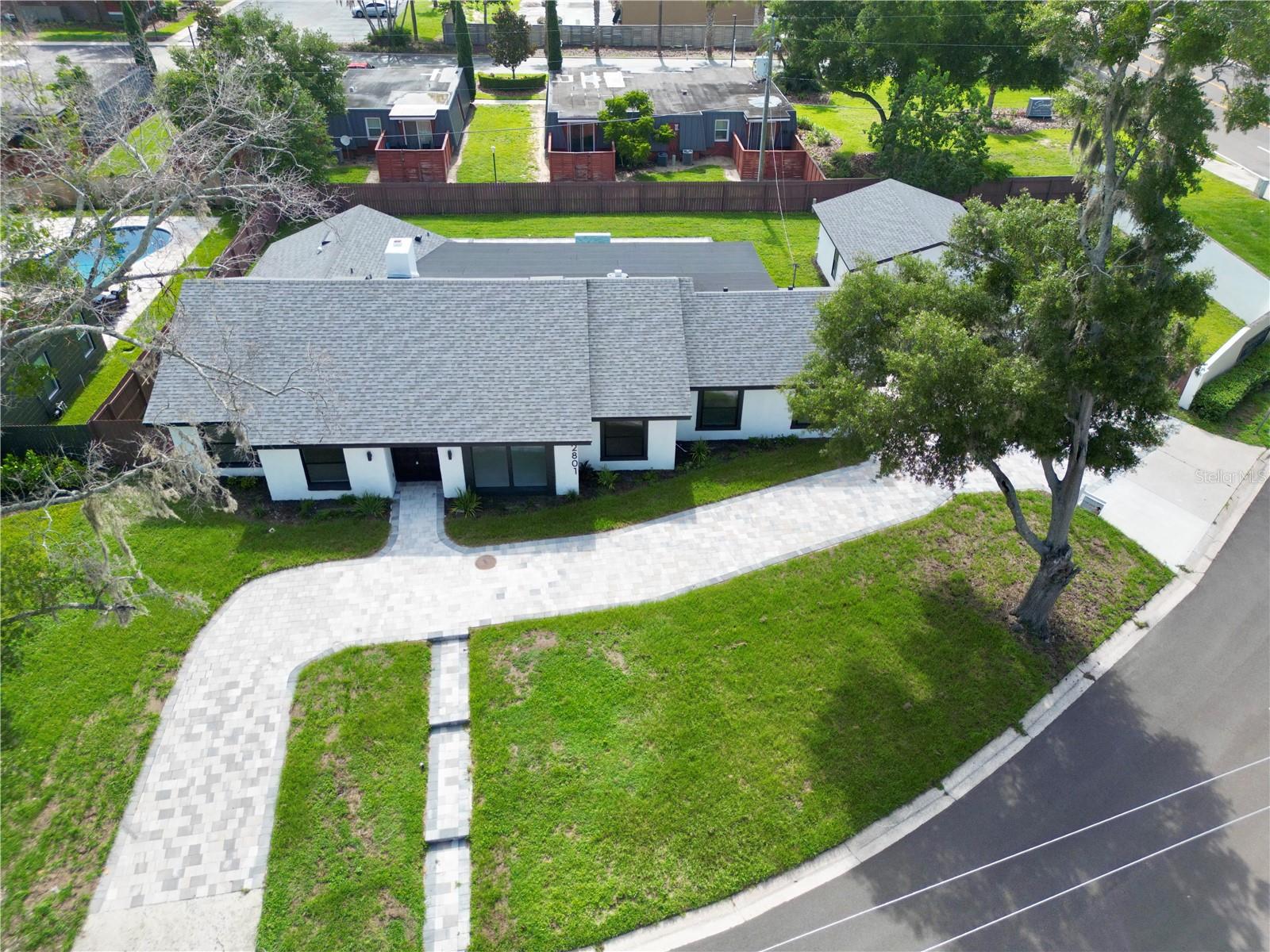 Welcome to Dommerich Hills, where modern style meets everyday comfort. This beautifully renovated home offers the freedom of **NO HOA** and has been thoughtfully updated from top to bottom. From the paver driveway and elegant double-door entry to the bright, open-concept interior, every detail has been designed to make you feel at home.The heart of the home is a stunning chef-inspired kitchen featuring sleek custom cabinetry, stainless steel appliances, and a striking waterfall island with custom wood accents,perfect for entertaining family and friends. The spa like bathrooms has glass-enclosed showers, contemporary fixtures, and designer finishes that create a relaxing retreat.Step outside and discover your own private Florida oasis. A covered lanai overlooks the sparkling pool and expansive paver patio, creating the ideal space for outdoor dining, weekend gatherings, or simply unwinding in the sunshine.Conveniently located just minutes from major highways, shopping, dining, and entertainment, this beautifully renovated home combines modern design with everyday functionality. Schedule your private showing today and experience everything this exceptional property.