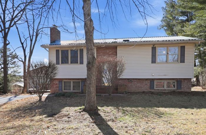 Opportunity awaits in this two bedroom, one bath home with walk out basement. Cozy fireplace for  cold winter nights. Some work/refreshing is required to make this home move in ready but could be worth the effort. Whether you decide to customize this home for yourself or rent it out, this house could be a great option. Property sold in “as-is” condition without repairs or warranty. Buyer is responsible for verifying all information contained in this listing.