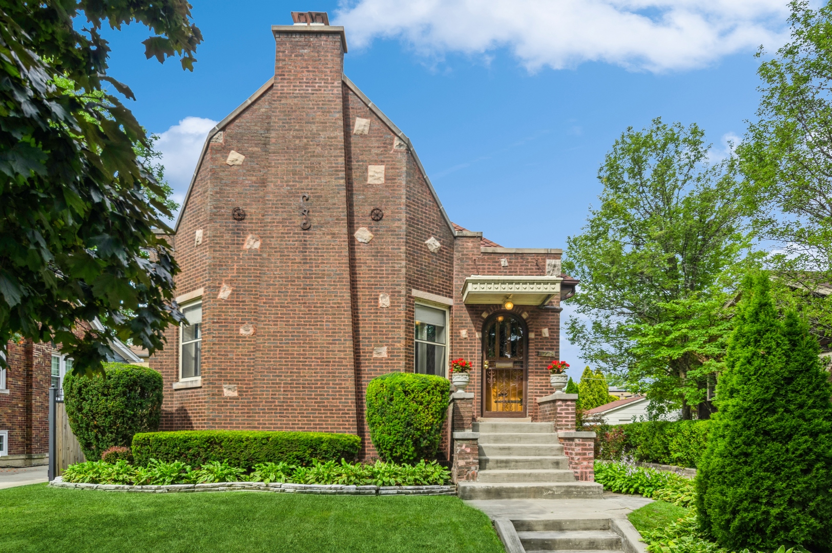 FOREST GLEN COMMUNITY! A RARE AND SPECIAL OPPORTUNITY TO OWN THIS EXCEPTIONAL ARCHITECTURALLY DISTINCTIVE BRICK ENGLISH TUDOR GEM! FILLED WITH NATURAL LIGHT THIS HOME OFFERS STUNNING VINTAGE ELEGANCE PLUS SMART MODERN UPDATES. MAIN FLOOR CONSISTS OF A SPACIOUS FOYER, COLOSSAL LIVING RM WITH FLOOR TO CEILING MANTLED BRICK WOOD BURNING FIREPLACE AND GORGEOUS BEVELLED GLASS FRENCH WINDOWS, GIANT FORMAL DINING ROOM WITH BAY WINDOW. PLASTER COVE CEILINGS, ORIGINAL WOOD TRIM, DOORS AND HARDWOOD FLOORS. 2 EXTRA LARGE BEDROOMS (PRIMARY WITH WALK IN CLOSET). BEAUTIFUL AND SPACIOUS MAPLE WOOD 42" CABINET KITCHEN WITH GRANITE COUNTERS, STAINLESS STEEL APPLIANCES, A GARDEN WINDOW AND A SEPARATE DESIGNATED AREA FOR A TABLE OVERSEES WELL LANDSCAPED FENCED YARD. NEUTRAL AND STYLISH UPDATED BATH. SECOND LEVEL FEATURES 2 ADDITIONAL BEDROOMS, POWDER ROOM AND ABUNDANT STORAGE IN UNFINISHED PORTION OF ATTIC. BASEMENT COMPLETE WITH PANELED RECREATIONAL ROOM, REMODELED BATH, UTILITY ROOM AND LAUNDRY. 1.5 CAR GARAGE. ROOF REPLACED ( 3/2012 ) WITH HIGH END SHINGLES WITH A 50 YEAR TRANSFERABLE COVERAGE. CHIMNEY WAS REBUILT IN 2009. MOST MAIN FLOOR MARVIN WINDOWS AND STORMS INSTALLED IN 2009. KITCHEN GARDEN WINDOW INSTALLED 2014. 2ND FLOOR WINDOWS-2014. NEW COPPER WATER SERVICE 06/25. HOME IS IDEALLY LOCATED TO SHOPPING - MARIANO'S, WHOLE FOODS, TARGET, STARBUCKS, METRA, PARK, I90/I94, SHORT DISTANCE TO BLUE LINE, O'HARE AND FOREST PRESERVE WITH BIKE/WALKING TRAILS...SOLD "AS-IS".