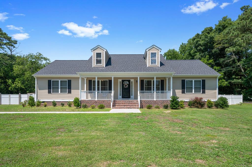 Pristine Ranch Home 3 Years Young built by Mitchell Homes Called "The Vincent" features 2 large bedrooms w/addtl 3rd BR/Bonus Rm.  Family Rm Features Large Gas Fireplace and access to a 16 x 16 Deck . Open Floorplan, Granite counter in Kitchen. SS appliances, tile flooring, Gleaming Hardwoods in LR and DR, 2 Ceiling Fans, Large Brick/Concrete Covered Porch on Front of house 28' long x 9'7 wide for birdwatching enjoyment.  Privacy is offered in Fenced rear yard with a workshop/shed and Metal Roofed unfinished area which can be finished for a garage or storage area.   Seller prefers buyers to have a prequalification lender letter and for appointment needing 24 hr notice.  Bayside and a short distance to the Chesapeake Bay Waters.