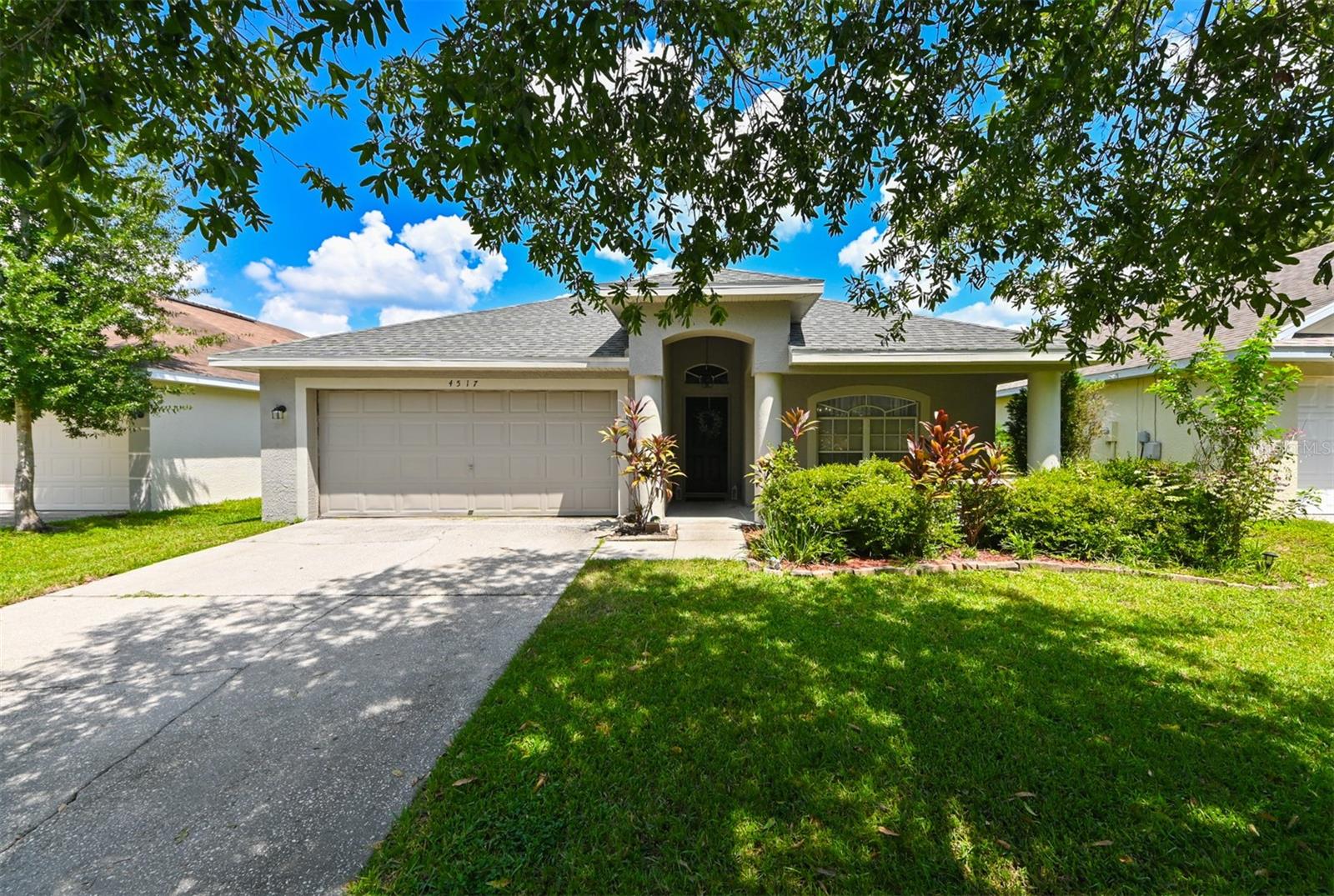 Discover this well-maintained updated home in the neighborhood of Villa Rosa in Lutz, located within top rated schools; McKitrick, Martinez, and Steinbrenner.
Featuring 4 bedrooms, 2 bathroom and a converted 2-car garage that is heated and cooled by main house HVAC (not a mini split).  This home has a lot to offer!  
Walking into the entry of the home you will find the formal living and dining area.  The open floor plan is ideal for entertaining with the kitchen in the heart of the home featuring, quartz counter tops, stainless steel appliances, eat-in dining, and plenty of space for food prep and storage.
Vinyl flooring throughout, vaulted ceilings, primary bedroom with en-suite and large walk-in closet, ample sized secondary bedrooms. Garage is versatile, can function as garage, workshop, or livable space. Yard is fully fenced.  Roof (2022), tankless water heater (2022), HVAC (2022). Located near Publix grocery (4 Miles), Veterans Expressway/Suncoast (1.4 Miles), Tampa International Airport (18 miles), TPC Tampa Bay golf course (1.4 miles), and more.