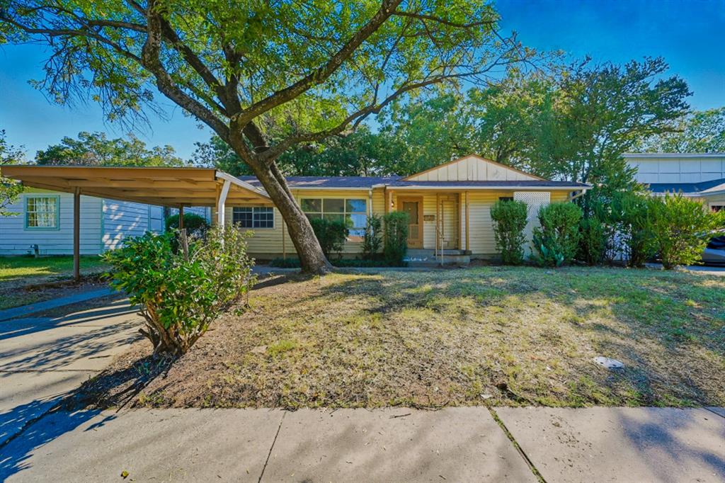 Great opportunity in Irving near the University of Dallas! This home offers spacious living areas with an open kitchen layout, perfect for everyday living or entertaining. The bathroom has been nicely remodeled, and some of the original hardwood floors remain for that classic charm. Enjoy a large fenced backyard featuring three storage buildings, two of which are nearly new, plus convenient alley and street access with a carport. Indoor utility room adds extra convenience. With easy access to Highway 183, you’re just minutes from Downtown Dallas, DFW Airport, Las Colinas, and more. Home could use some additional updating and is priced well below market for an as-is sale. Owner is a licensed real estate agent.