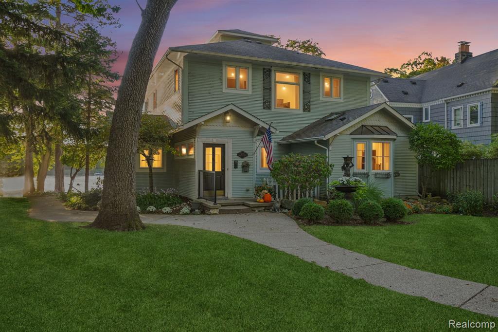 Welcome to a rare opportunity to own a true slice of paradise on the serene shores of Lotus Lake. This breathtaking 4-bedroom colonial offers the perfect blend of luxury, privacy, and natural beauty, complete with your very own small private island, a newly built pole barn, and a private dock just steps from your door. From the moment you arrive, you're greeted with panoramic lake views, expansive outdoor space, and a sense of peace that feels more like a vacation retreat than a residence. Whether you’re boating, fishing, or simply unwinding by the water, every day here feels like a getaway.
