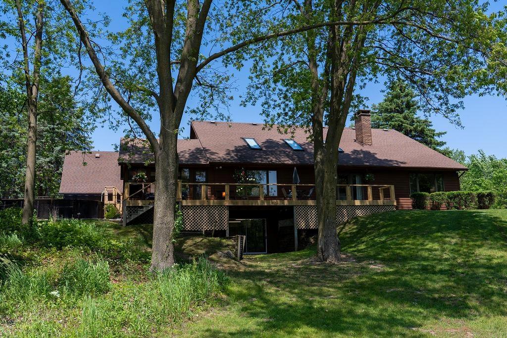 Enjoy breathtaking views on over 10 acres of wildlife paradise, complete with a creek and a spacious deck perfect for relaxing or entertaining. This open-concept home features a massive granite island at the heart of a beautifully designed kitchen-ideal for gatherings and everyday living. The main floor primary suite offers peaceful views of nature, making every morning feel like a retreat. Upstairs, both bedrooms boast private en-suite bathrooms and walk-in closets. Downstairs, the fun never ends! A game room, playroom, and wet bar area (plumbed and ready) create the ultimate entertainment zone. Plus, theres a full bathroom and a dedicated office space-perfect for work-from-home needs. Enjoy the best of both worlds: seclusion and convenience, just minutes from town. Additional highlights include a 4-car attached garage and a large above ground pool for endless summer enjoyment.