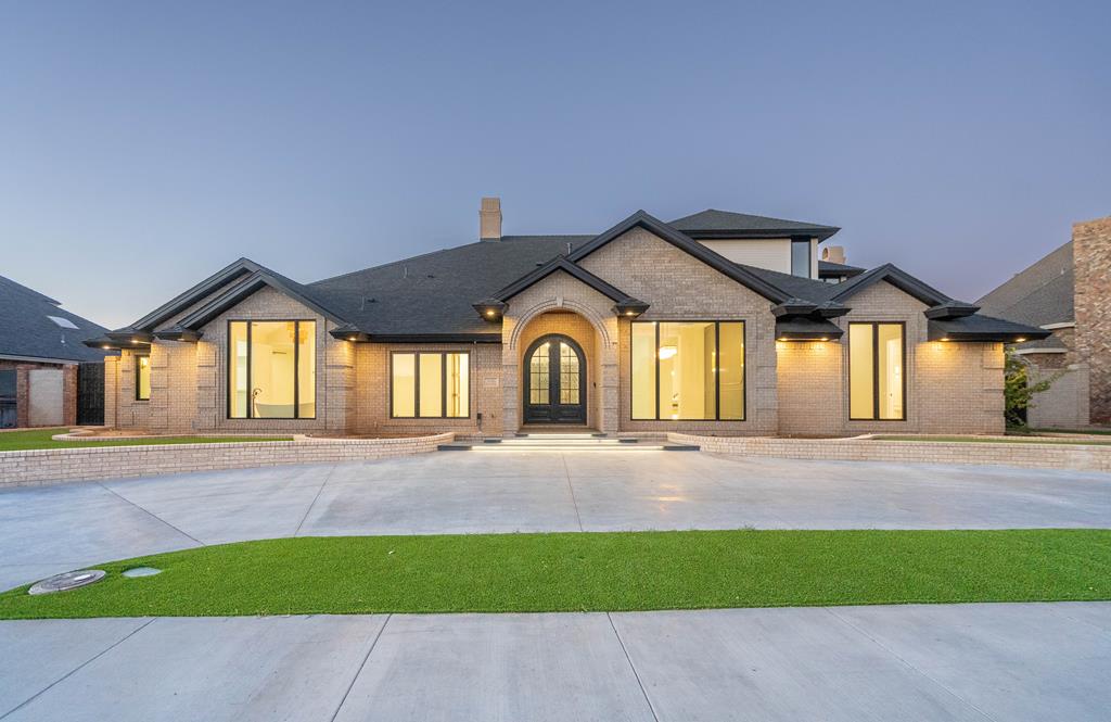 Elegant luxury in this completely re-built prestigious residence with unmatched five star quality throughout.  5 bedrooms, 5 baths, 4 half baths, 4 living areas plus a study, gourmet kitchen with Thermador double ovens,  2 Bosch dishwashers,  Sub-Zero fridge, butler's pantry and custom lighting.  Sound system with speakers throughout home and patio's, 4 car garage, an elevator, new 40 year roof with class 4 high impact shingles, new Marvin Ultimate Series windows, artificial turf (no grass to mow). The pool, hot-tub and deck all new!