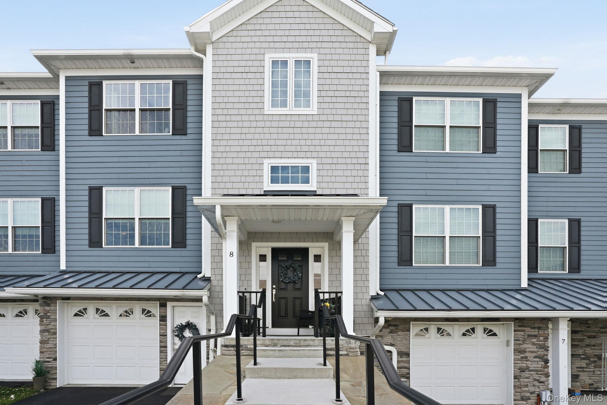 Welcome to 8 Muscoot River Road, Yorktown Heights — a stunning virtually new construction townhouse built in 2021, offering the perfect blend of luxury, comfort, and low-maintenance living. Located in the highly sought-after Somers School District, this beautifully designed home features tri-level living with 2 bedrooms that lives like a 3-bedroom home, along with 2.5 bathrooms and exceptional custom finishes throughout.From the moment you arrive, the home’s incredible curb appeal and beautifully landscaped exterior set the tone for what awaits inside. The main level boasts a bright open floor plan with gorgeous hardwood floors, an abundance of natural light, and upscale details throughout. The chef’s kitchen is complete with granite countertops, plentiful cabinetry, and seamless flow into the dining and living areas — perfect for both everyday living and entertaining. A custom stone electric fireplace serves as the centerpiece of the living space, creating warmth and elegance.Upstairs, the spacious primary suite offers a large walk-in closet and a beautifully appointed private bathroom. The additional bedroom and flexible living space provide versatility for guests, a home office, or additional sleeping accommodations.The finished lower level presents endless possibilities — whether you envision a media room, gym, playroom, office, or additional living area, the space is ready for your imagination.Conveniently located near Somers, Mahopac, and the center of Yorktown, you’ll enjoy close proximity to shopping, restaurants, parks, and major conveniences while still enjoying a peaceful residential setting. With incredibly low HOA fees of just $222 per month, this is a rare opportunity to own a luxury, low-maintenance townhouse in one of Northern Westchester's most desirable locations.