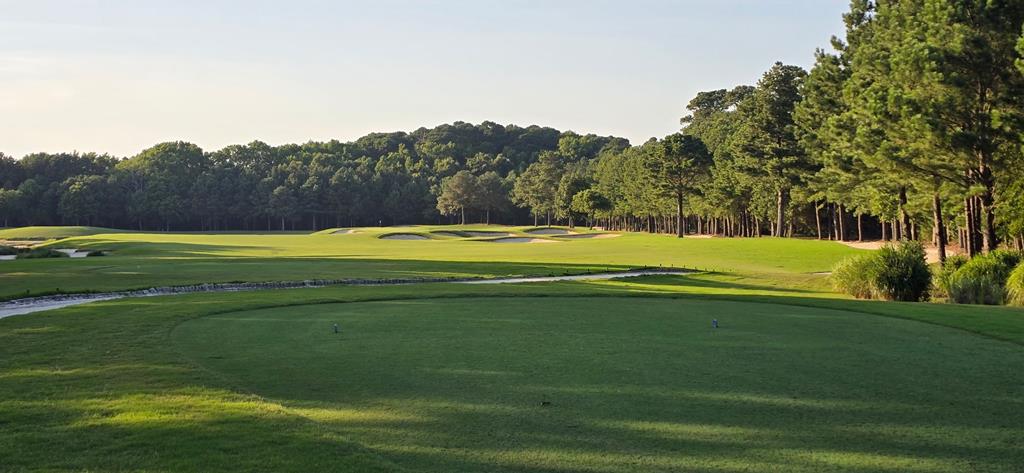 Spectacular Corner Lot with 112 ft on the Fairway on the Jack Nicklaus Course. This is one the largest and  most private of all the lots in the new Muirfield section of Bay Creek. Flexible building options  with a choice of entrances will allow you create your unique dream home. Conveniently located just short walk or golf cart ride from the Life Center and the community's Private Beach on The Chesapeake Bay ! Bay Creek were Luxury is a Life style.  Freedom to chose your own builder from Bay Creeks approved list.