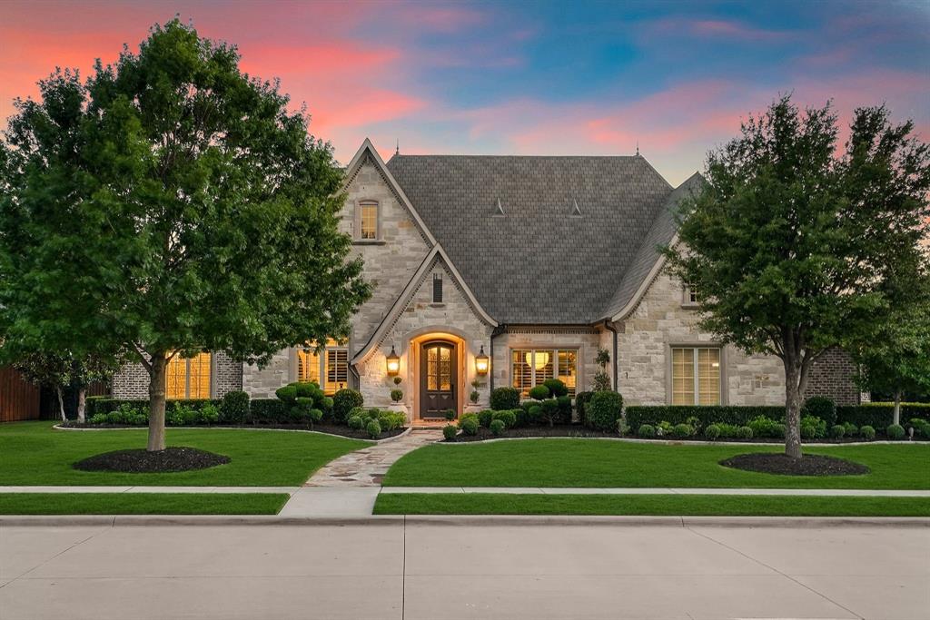 A truly one of a kind residence, this custom Greg Alford masterpiece is more than a home, it is a work of fine art. Positioned on nearly half an acre within the prestigious guard gated community of Normandy Estates, this exceptional estate offers the rare balance of privacy and connectivity, just minutes from Legacy West, The Star, and both DFW International and Love Field airports. Every space has been thoughtfully curated to blend architectural beauty with exceptional livability. The private outdoor retreat takes center stage with a resort style heated pool and spa, fully equipped outdoor kitchen, expansive covered patio, and motorized screens that create a seamless indoor outdoor lifestyle year round. Framed by lush landscaping and exceptional privacy, the backyard feels like a private luxury resort. Inside, a grand foyer introduces an impressive collection of thoughtfully designed spaces, including an elegant formal dining room, a dedicated study, and expansive living areas. Hand scraped white oak flooring, designer lighting, soaring wood beams, and a cast limestone fireplace showcase the craftsmanship and attention to detail found throughout. Oversized windows flood the home with natural light while capturing picturesque views of the grounds. At the heart of the home, the chef's kitchen is a true showpiece, featuring an oversized quartz island, illuminated custom cabinetry, a 7 burner gas range, double ovens, dual dishwashers, and a wine refrigerator. The thoughtfully designed 1.5 story floor plan offers a luxurious primary retreat with a spa inspired bath, soaking tub, dual vanities, and two walk in closets, along with two additional ensuite bedrooms and a versatile bonus room on the main level. Upstairs, a private guest suite and dedicated media room provide the perfect space for family and visitors alike. Rarely does a home of this caliber, character, and custom distinction become available.