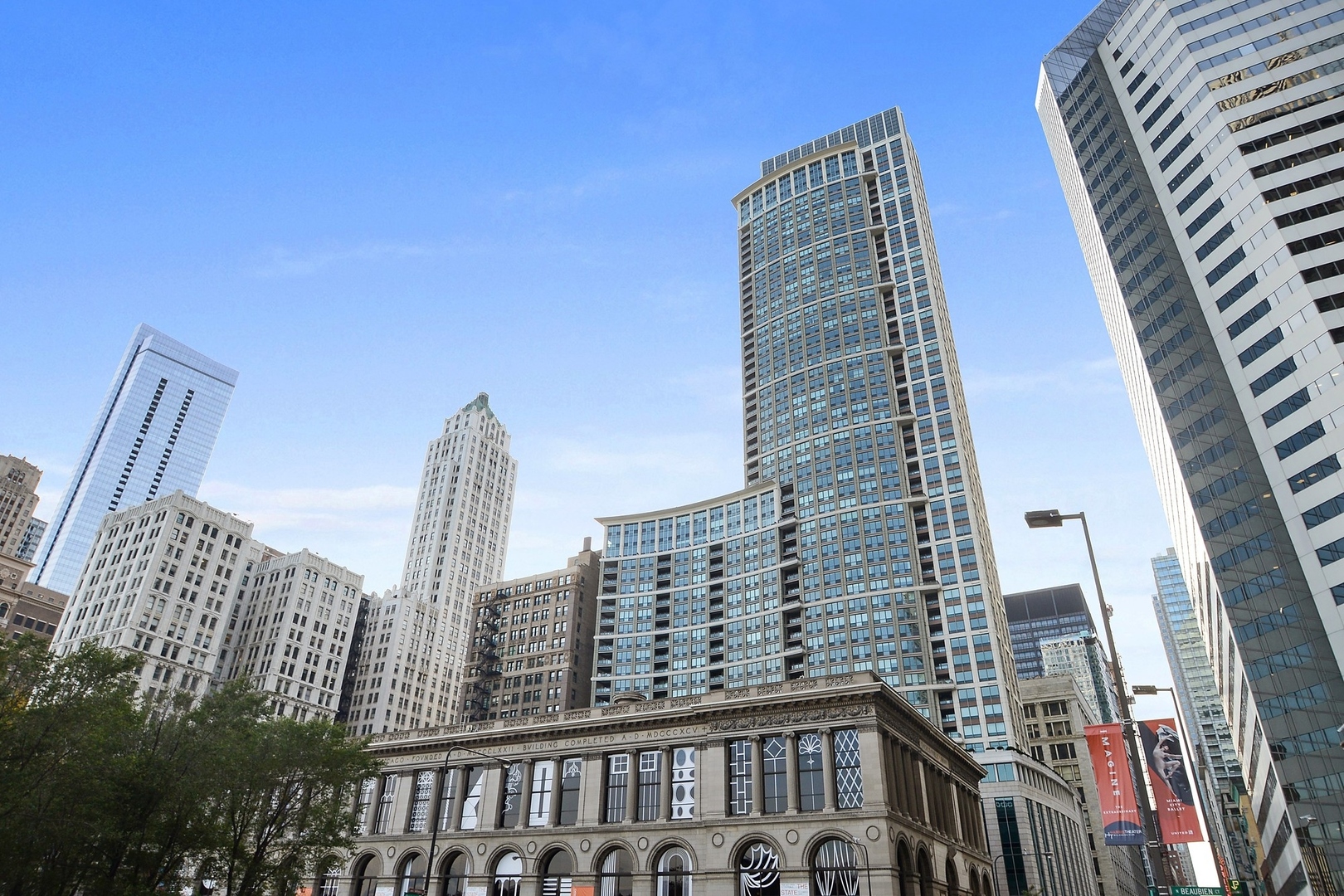 First-class renovation with magnificent views of Lake Michigan, Millennium Park, The Bean and the city skyline from floor-to-ceiling windows - every room faces east! This one-of-a-kind home was renovated with a top-of-the-line design and finishes. The 3rd bedroom was opened up to the living areas and can easily be converted back to a bedroom. Beautiful oak wood floors, recessed LED lighting, custom ceiling lights and surround sound throughout the home.  The spacious living-dining area includes custom designed dry bar area.  Open chef's kitchen features Copatlife Italian cabinets with lift doors on upper cabinets, quartz countertop with single bowl stainless steel undermount sink and luxury appliances (Viking refrigerator-freezer, oven, cooktop, microwave and dishwasher). Stylish island has breakfast bar seating for 4 people and additional cabinetry. Expansive master suite has amazing views of Lake Michigan and Millennium Park, and a custom walk-in closet. Beautiful marble master bathroom with Pedini floating lacquer cabinets, dual Vttinox stainless steel sinks and countertop, whirlpool bathtub and separate marble shower. Guest bedroom has custom closet interior and overlooks the private balcony. Guest bathroom has Pedini floating lacquer cabinet with quartz countertops, marble shower and porcelain tile floor in a beautiful herringbone pattern.  Powder room has Pedini floating lacquer cabinet and custom lighting.  Laundry closet with side-by-side washer/dryer. Full-amenity luxury condo building with 24-hour door staff, on-site management, party room, conference room, sauna, indoor pool, fitness center, 3 outdoor terraces, dog run, dry cleaner, receiving room, storage locker, Pedway access and more! Amazing location in walking distance to lakefront, Millennium Park, Grant Park, Chicago Theater, Art Institute Museum, Orchestra Hall, Lyric Opera, shopping, restaurants, transportation and more! 1 deeded parking space 8-40 available at $50K.