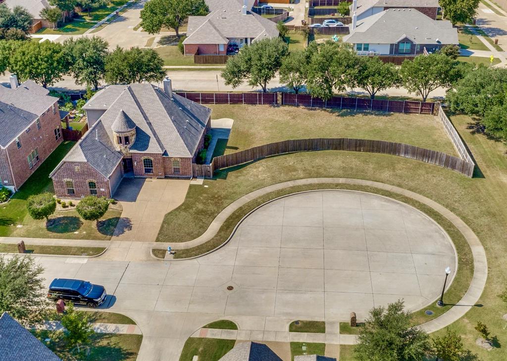 Rare opportunity! Hard to find oversized double lot on a cul-de-sac in the desirable Trails of Glenwood in East Plano. Just a 5 Minute Walk to McCall Elementary School! The large 2 story home features 4 bedrooms, 3 full baths, dedicated office and formal dining. Updated kitchen with beautiful cabinets, granite countertops, large island, stainless steel appliances. The kitchen is open to the additional dining and living room. Excellent layout with Primary and 2 bedrooms downstairs. Upstairs you'll find a large family room and guest suite with a full bath. Beautiful hardwoods, soaring 12ft ceilings, attached 2 car garage. Step outside to the backyard and the possibilities are endless, concrete patio, shed, large fenced yard at the end of the cul-de-sac. HOA also has a pool and playground. Excellent East Plano location! Recent Updates - New Water Heater, New Dishwasher, New Dining Kitchen Light, Replaced All Blinds, Custom Living Room TV Mount & Wiring, Storage Shed, New Vent in Kitchen.