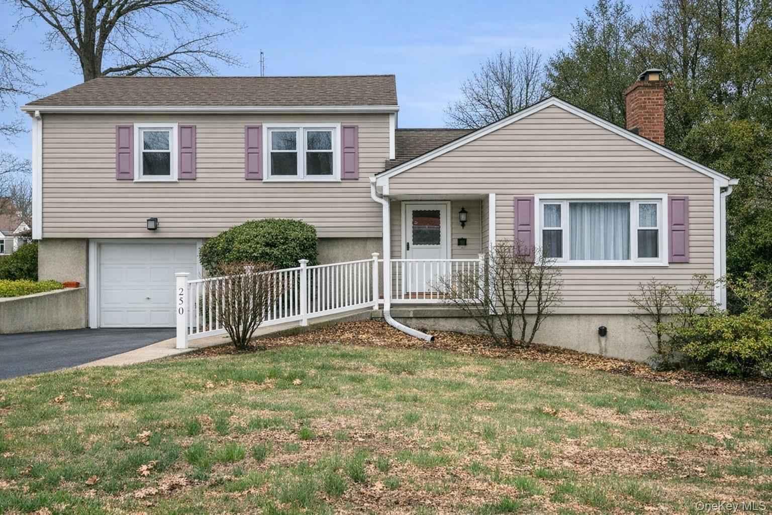 Located in the Rye Neck section of the Village of Mamaroneck, this Well-Kept Split-Level Home offers 3 bedrooms & 2 bathrooms on an oversized lot & provides open-concept living areas for comfortable & Modern Living. On the first floor, there’s a welcoming entry hall, a renovated kitchen with granite countertops & a peninsula for seating that flows into the formal dining area, as well as a generous living room complete with a wood-burning fireplace. Upstairs includes 3 Bedrooms highlighted by a Primary Suite with a Private Bathroom & walk-in closet & an additional hall bathroom. The lower level provides a versatile Den or Home Office, a laundry room, Garage access, and direct entry to a spacious Terrace and Backyard. The unfinished basement houses utilities and extra storage. Close to the Mamaroneck train station, shops, restaurants, and Harbor Island, this home offers both comfort and convenience.  Take advantage of the chance to call this stunning house your new home. Taxes do not reflect the STAR Exemption.