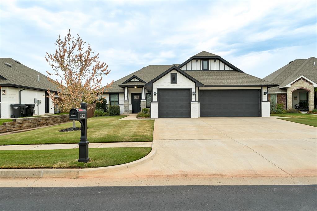 Welcome to this beautifully maintained Edgewater home in Moore, Oklahoma, offering approximately 1,740 square feet of comfortable living with exceptional outdoor spaces. The home features a distinctive black-and-white exterior, painted brick, stone accents, decorative gables, black gutters, and a spacious three-car garage. Inside, you'll find a functional, inviting layout with warm wood-look flooring, neutral finishes, updated lighting, abundant storage, and versatile living spaces. The kitchen, living areas, bedrooms, office, bathrooms, and custom built-ins are designed for both everyday living and entertaining. The backyard is a standout feature, offering an expansive covered patio with multiple seating areas, ceiling lighting, string lights, and plenty of space for gatherings or relaxing outdoors. The fully fenced backyard provides a large lawn ideal for pets, play, gardening, or future outdoor improvements. A landscaped flower bed and gravel side yard with stepping stones add both beauty and functionality.The welcoming covered front porch features substantial stone columns, a contemporary black entry door, updated hardware, and attractive exterior lighting. Mature landscaping, a well-maintained lawn, landscaped beds, and a wide driveway enhance the home's curb appeal. Located in the desirable Edgewater community, this home offers convenient access to shopping, dining, schools, parks, and major roadways. With its spacious three-car garage, attractive updates, and impressive outdoor living area, this home is move-in ready and offers the perfect combination of comfort, style, and functionality.