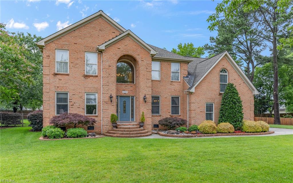 This stunning 2-story brick home with approx. 3648 sqft combines comfort & convenience, just moments away from restaurants, shopping, schools, & the beach.  
With 5 spacious bedrooms & 2.5 baths, there is plenty of room for family & guests.  The open kitchen, appealing to the aspiring chef & casual entertainer, boasts sleek countertops & ample storage space, flowing into a light-filled den where a cozy fireplace creates warm relaxing evenings at home. 
The design features a spacious loft connected to a bedroom to accommodate guests. Hardwood, ceramic tile, NEW carpet & FRESH paint provide comfort & durability.  The home has an UPDATED fuse box with a surge protector & crawlspace UPDATED with a dehumidifier. 
An oasis awaits outside- an impressive in-ground pool with SOLAR heat, hot tub, deck & screened-in porch surrounded by beautifully landscaped grounds, ensures endless summer fun. 
This true paradise combines luxury, functionality, & prime location. Call now and schedule a TOUR!
