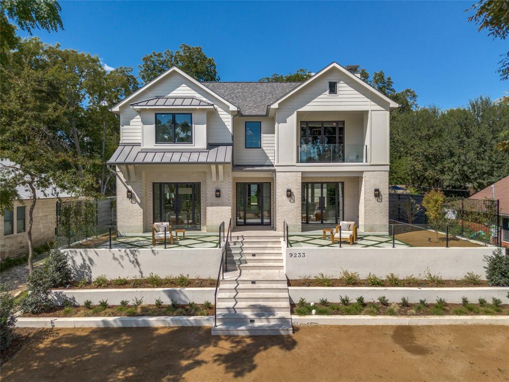 Don't miss this stunning new-construction home perfectly positioned on the coveted Peninsula at White Rock Lake. Designed with architectural sophistication and serene privacy in mind, this five-bedroom, five-and-a-half-bath masterpiece blends contemporary design with timeless comfort.  
The open-concept living spaces are ideal for entertaining, anchored by a gourmet chef’s kitchen with professional-grade appliances, custom cabinetry, and a generous island for gatherings.  Walk in pantry has a second dishwasher, sink, ice maker and wine refrigerator.  

Each bedroom is a private retreat, complete with en-suite baths and designer finishes.  Upstairs, a stylish coffee bar offers the perfect morning retreat adjacent to the primary suite and office. The primary suite offers tranquil views of the park, a spa-inspired bath, and two  spacious walk-in closets.  The expansive laundry room is equipped with it's own dishwasher, sink, and double stackable washer and dryer space.  Outdoor living is equally refined—whether you’re enjoying the peaceful courtyard with a fire pit, al-fresco dining on the patio, or exploring the scenic lake trails just beyond your doorstep.

Every detail of this home reflects exceptional craftsmanship, thoughtful design, and the rare opportunity to live on one of Dallas’ most sought-after lakefront neighborhoods.