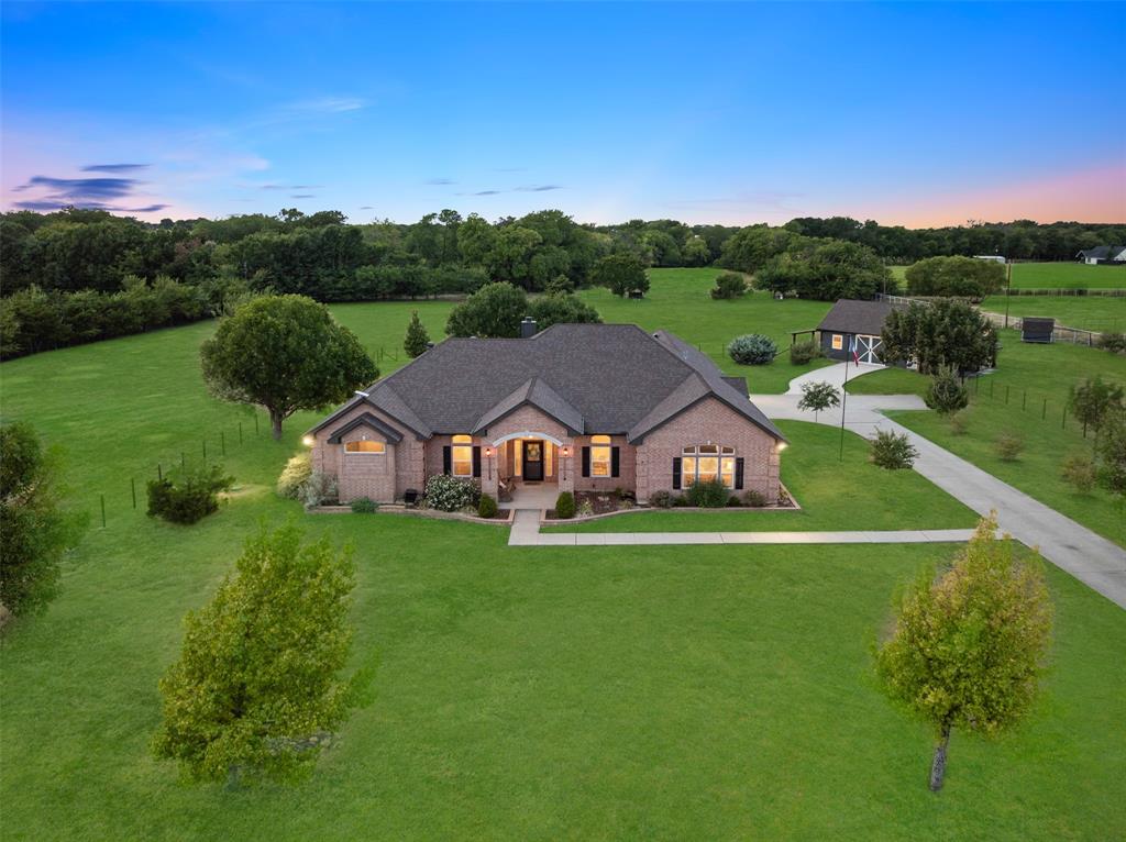 Escape to a peaceful country lifestyle without giving up convenience. Set on approximately 5 picturesque acres between the Outer Loop and Highway 380, this beautifully updated 3-bedroom, 2.5-bath, 1 story home offers space, comfort, thoughtful updates, views and endless possibilities.Enjoy relaxed mornings, wide-open views, and evenings gathered around the pool with family and friends. Inside, the home has been completely updated including flooring, paint, countertops, backsplashes, foam insulation, windows + so much more look at docs online.  Interior floorplan features a formal living-gathering room, office that could be the 4th bedroom, dining room, large primary + spacious ensuite bath, great family room and kitchen w-2 ovens, wine fridge, wet bar and breakfast nook + oversized laundry room w-sink & closet.  Two guest rooms are in their own wing.Designed for both enjoyment and functionality, the property includes a new two-stall barn, separate sheep-wood shed, chicken coop, two beehives, and multiple segmented, fully fenced pastures. Entire property is fenced w-electric gate entrance. Whether you dream of raising sheep, keeping chickens, caring for horses, riding ur ATV out back, cultivating a hobby farm, or creating a revenue-generating property, this acreage is ready to support your vision.With no HOA, MUD, PID, or known property restrictions, you have the freedom to make the most of the land. Prosper ISD adds to the appeal, while nearby shopping, dining, schools, and everyday amenities keep you connected to everything you need.This is more than a home—it’s an opportunity to embrace country living, create lasting memories, and enjoy the flexibility of acreage in a convenient location.  So much to love about this home and property - truly turnkey!!! See Transaction Desk for Survey and Improvements-Updating details