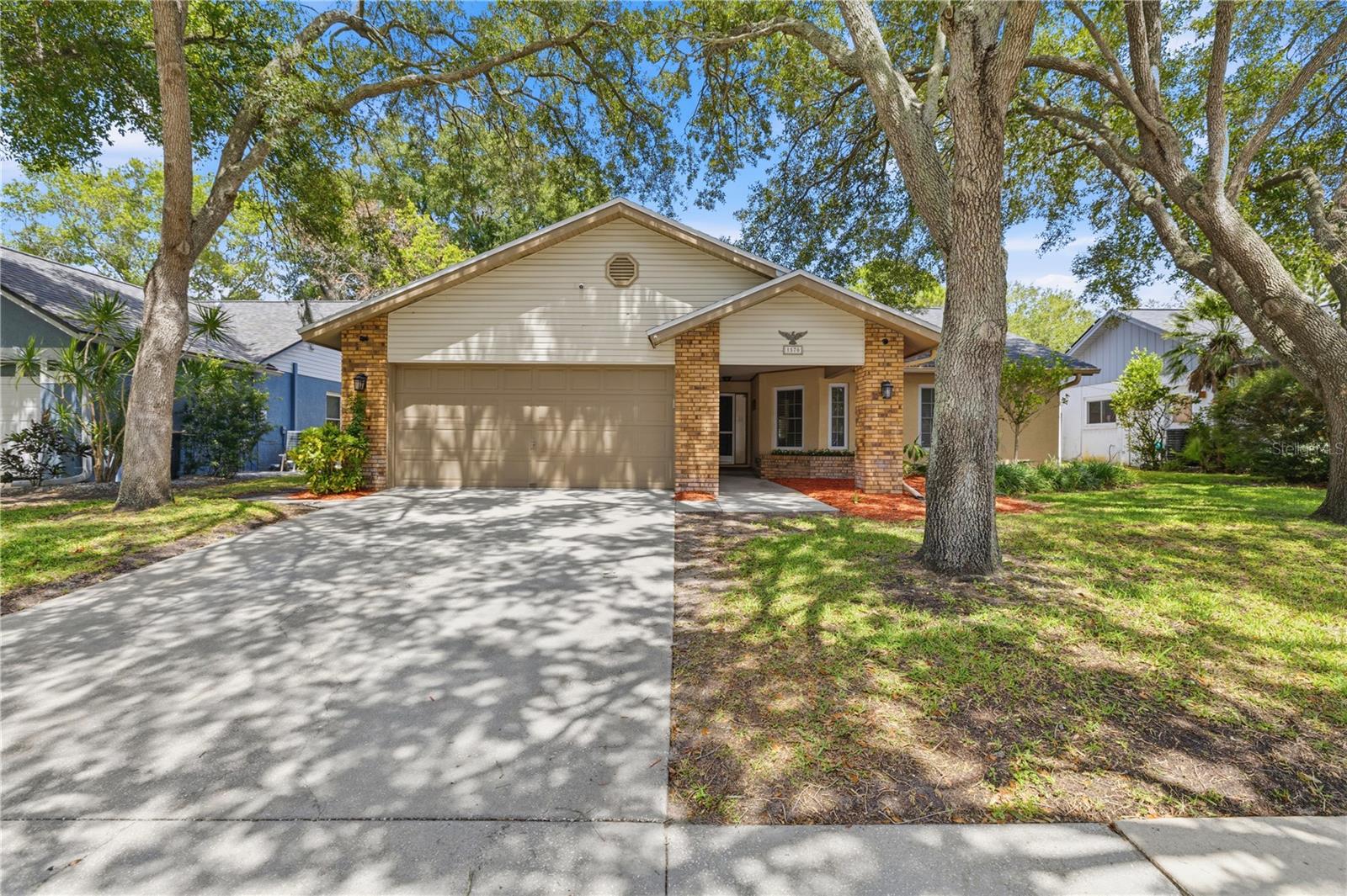 Just minutes from the shops, restaurants, and sponge docks of downtown Tarpon Springs, this 3-bedroom, 2-bathroom home offers 2,249 square feet of light-filled living space. High ceilings and abundant natural light create an airy, open feel throughout. Recent updates give this home real move-in confidence: a newer roof (2020), updated HVAC (2025), and fresh interior paint (2026). Home offers an open floor plan with a spacious kitchen that features a large island. Set in a sought-after community with a pool and clubhouse, and zoned for Tarpon Springs Elementary, Middle, and High School. Flood zone X means no worrying about water intrusion or insurance yet easy proximity to Tampa Bay's beaches and coastal lifestyle.
