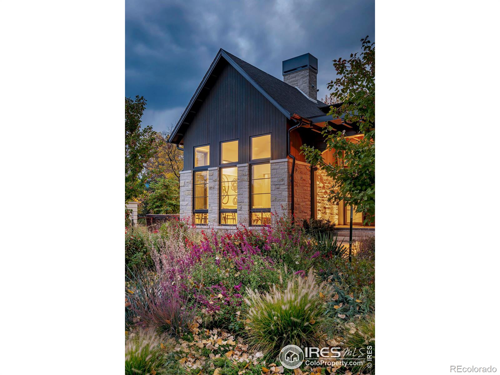 Meticulously crafted, masterfully built, and expertly curated with an elevated design, this custom home is a true masterpiece, perfectly situated on a premier lot in the exclusive Carolyn Heights neighborhood, The exquisite design and inspiring architecture of this exceptional residence ensures that every facet embodies luxury, casual elegance, and attention to detail, harmoniously blending wood, glass, stone, and steel to create an ambiance that is both inviting and inspiring. Upon entry, you'll be greeted by soaring ceilings, wide plank white oak flooring, & an open-concept main level bathed in abundant natural light streaming through expansive windows, inviting the outside in. The prodigious living area seamlessly integrates indoor & outdoor spaces, offering a glimpse of the splendid living experience that awaits. The architectural grandeur is showcased w/ a dramatic three-story open-tread wooden staircase, custom steel railings, & illuminated by bespoke lighting. The centerpiece of the home, the gourmet kitchen, boasts an impressive center island, marble & quartz countertops, artisanal tile, custom cabinetry, top-tier chef's appliances, & walk-in pantry. The elegant main floor primary bedroom suite is a tranquil retreat, w/ wall-to-wall windows, a generous walk-in closet w/custom cabinetry. The soothing primary bathroom features premium quality finishes, including designer tile, custom cabinetry, & alluring lighting.The heated pool w/ a tanning shelf, natural stone deck, & automatic pool cover takes center stage in the serene yard. Every aspect of this smart home seamlessly integrates technology, design, & automation to ensure security & convenience, and efficiency. For the discerning owner desiring a residence that embodies casual elegance & architectural interest, w/proximity to vibrant downtown Boulder & nestled in an upscale neighborhood, this property is a rare find that offers an unsurpassed lifestyle.