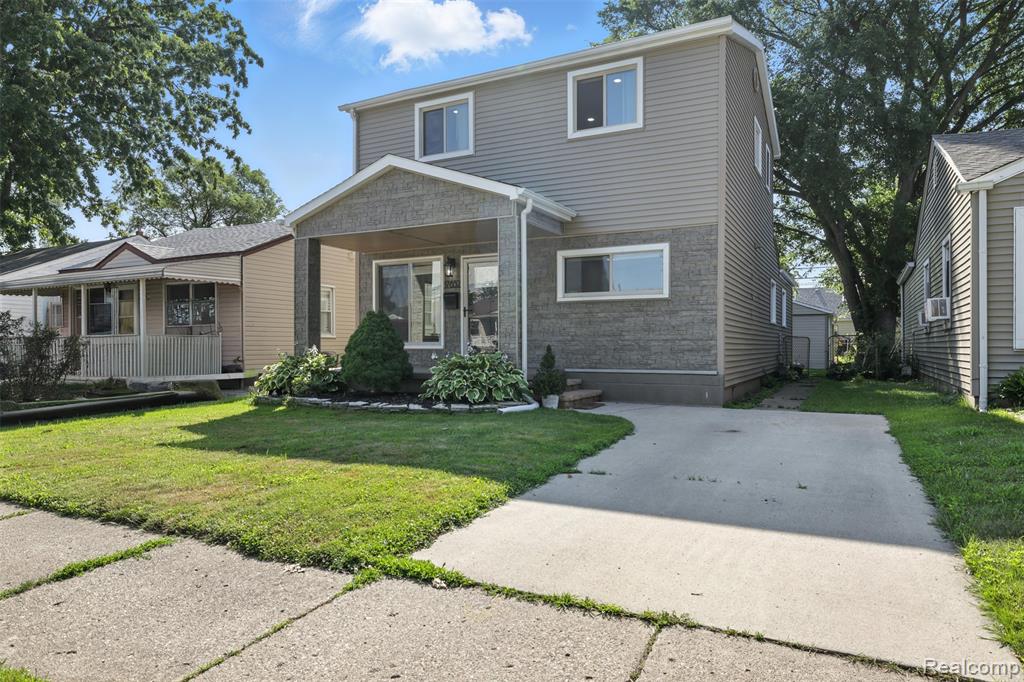 Welcome home to this beautifully updated 3-bedroom, 2-full-bath colonial in the heart of Melvindale! This move-in-ready property features over 1,600 square feet of finished living space, combining classic charm with modern updates throughout. Step inside to find a spacious main level with a bright living room, formal dining area/family room off a fully remodeled kitchen featuring new cabinets, countertops, and modern fixtures. Both full bathrooms have been tastefully renovated with contemporary finishes. All three bedrooms are spacious, offering comfort and privacy. The exterior boasts a beautiful backyard, perfect for entertaining or relaxing, and a 2-car detached garage with a driveway for additional parking. Located on a quiet residential street, this home is within walking distance to parks and schools, with easy access to shopping, dining, and major freeways. This is a perfect opportunity for a first-time buyer, growing family, or investor looking for a turn-key home in a great neighborhood. Property is occupied, please do not approach without an appointment. All measurements are approximate. BATVAI