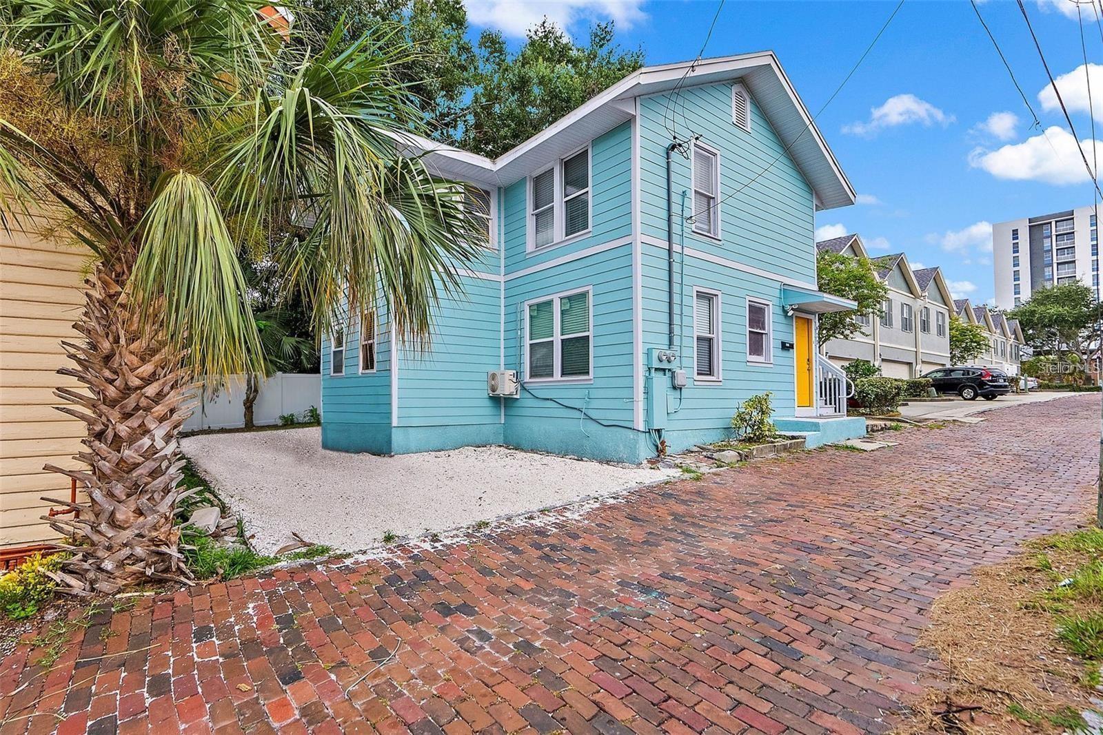 Downtown St. Pete Triplex: Three Units, One Unbeatable AddressTriplexes in the heart of Downtown St. Petersburg rarely come to market. This one offers three income-producing units on a historic brick street, just blocks from Central Avenue, the waterfront, and the Tropicana Field district. It's freshly renovated with a coastal-style turquoise exterior and bold yellow doors, and it's full of personality and potential.All three units have been updated and are move-in ready. You could live in one unit while the other two help pay the mortgage. You could also hold all three as long-term rentals, or tap into traveling-nurse demand with major hospitals minutes away. Having multiple units gives you multiple income streams and room to adjust your strategy.The location is what sets this property apart. It's steps from Publix and close to cafes, restaurants, galleries, parks, and the waterfront. That kind of walkability keeps units rented. Major investment is reshaping the surrounding area, so this is a chance to own a multi-unit property in one of Downtown St. Pete's fastest-evolving pockets.The exterior is low-maintenance and the systems are updated. Live, rent, and grow your portfolio in one of Florida's most desirable downtowns.