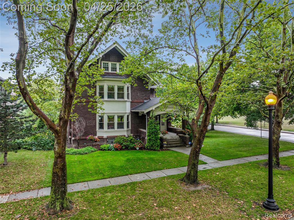 Welcome Home ! This early 20th century 3 story colonial sits on a rare pedestrian style (Hidden) street with access to Pallister Park. The decorative brick street is lined with mature trees and vehicle access only through garage access in the rear alleyway. Offering 5 bedrooms and 3 and a half fully remodeled bathrooms this home rarely comes to market. Wood Flooring throughout on each level including original wood banister staircase.