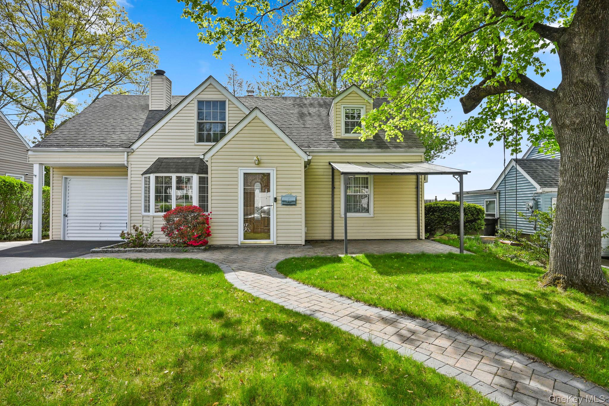 Charming 4-bedroom, 2-bath home located in the desirable Westchester Hills section of Yonkers. Step into a cozy living room featuring a fireplace and bow window, creating a warm and inviting atmosphere.The main level offers two bedrooms and a full bath, along with an eat-in kitchen and dining area equipped with a ductless A/C unit. The kitchen provides convenient access to the garage and a walkout to the patio/deck area.Enjoy outdoor living on the expanded deck, complete with a covered gazebo and ceiling fan—perfect for relaxing or entertaining.The second floor features two additional bedrooms, a full bath, and a flexible office/bonus room that can potentially serve as a fifth bedroom. One of the bedrooms also includes a walk-in closet. A private driveway accommodates up to four cars, adding convenience and value. *HIGHEST & BEST by Friday May 7,2026 3PM*