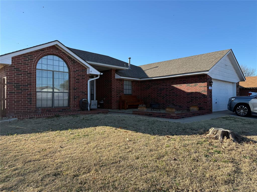 Walk into your beautiful home with some new flooring updates, some new paint, new dishwasher & disposal.  Refrigerator stays with home.  There's so much cabinet space & pantry.  Rooms are all good size with wrap around closet in Master bedroom.  There's separate shower, tub & double sinks in Master bathroom.  Yard is almost 1/4 acre on corner lot & you could have backyard access.  Storm shelter is in back yard & a 10 x 12 shed for yard equipment. Swing set stays, also.  It's located in great neighborhood near all the new restaurants & stores.  A new Target will soon be opening.  Come take a look today & make it your own!