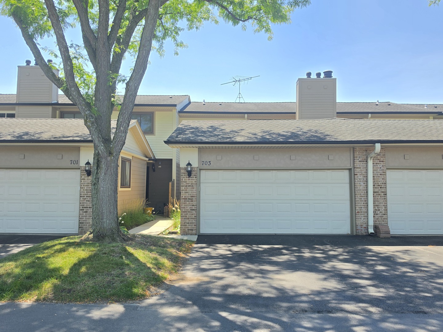 Fantastic opportunity to own this spacious 3-bedroom, 2.1-bath townhouse offering approximately 1,800 square feet of comfortable living space in highly sought-after unincorporated Deerfield! The bright and inviting floor plan features a generous living room, formal dining area, and an eat-in kitchen with ample cabinet space. Wood laminate flooring extends throughout the main and second levels, while the finished basement provides additional living space perfect for a family room, home office, recreation area, or workout room. The spacious primary suite includes a private bath, and two additional bedrooms offer plenty of room for family, guests, or a home office. Enjoy outdoor relaxation on your private patio, plus the convenience of an attached 2-car garage. Residents enjoy outstanding community amenities, including an outdoor pool, tennis courts, playground, party room, sundeck, and beautifully maintained common areas. Located within the award-winning Aptakisic-Tripp School District 102 and Adlai E. Stevenson High School District 125, and just minutes from shopping, dining, parks, major highways, and Metra. A wonderful opportunity to personalize a home with great space, an excellent layout, and an unbeatable location!