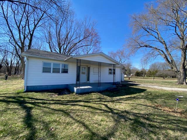 Approx. 1.73 acres with a one-story 3 bedroom home with attached garage situated near the ball field and close to the park in the Village of Coalton.  This property has city water, gas and sewer. If you are looking for a nice size pc. of property that provides you with a country like setting with city amenities, take a look at this one!!! 
The property being sold consists of 3 different parcels #08-27-331-019, 08-27-331-018  and 08-27-331-002 total taxes shown are for all 3 parcels $1,103