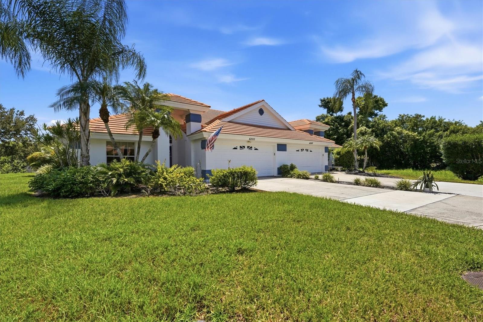 Serenity awaits at Westwoods at Sunrise Country Club in South Sarasota. Bright and airy, this beautifully renovated two-bedroom, two-bath villa offers 1,794 square feet and an exceptional combination of privacy, natural beauty, spacious living and resort-style amenities in a desirable Sarasota location. Tranquil pond and greenbelt views provide a peaceful backdrop, while new neutral painted interior, luxury vinyl plank flooring and designer light fixtures throughout create a polished, cohesive feel and enhance the home’s light-filled interiors. Begin your mornings with coffee or unwind at day’s end surrounded by lush tropical scenery, peaceful water views and native Florida wildlife. Soaring cathedral ceilings and skylights fill the residence with abundant natural light and create an open, welcoming ambiance. The spacious kitchen with adjoining dining area provides an inviting setting for everyday living and entertaining, while the expansive family room features dual skylights and generous space to gather and relax. A walk-in laundry room adds everyday convenience, while the private Florida room offers an ideal year-round retreat overlooking the serene pond and natural surroundings. The generous owner’s suite enjoys peaceful views and a private en-suite bath, creating a comfortable sanctuary within the home. Residents enjoy maintenance free living and resort-style amenities, including a community pool nearby, along with tennis and pickleball courts. Convenient access to Interstate 75, shopping, dining, medical services and everyday conveniences. Spend your days along the world-renowned quartz sands and turquoise Gulf waters of Siesta Key Beach, or experience the vibrant lifestyle of downtown Sarasota, celebrated for its exceptional dining, theaters, galleries, performing arts, waterfront parks and cultural attractions. An inviting opportunity awaits to enjoy the relaxed sophistication and natural beauty of the Sarasota lifestyle! Westwood 2 is NOT a 55+ area of the community.