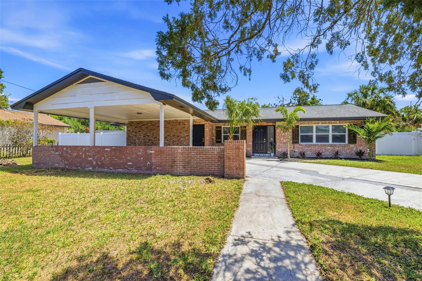 Welcome to 4433 Pompano Drive—a 4-bedroom, 2-bathroom home offering 1,499 square feet of stylish and functional living space, located in a non-flood zone for added peace of mind. Just approximately 15–20 minutes from Downtown Tampa, this home offers the perfect balance of convenience and comfort. Step inside to discover brand-new luxury vinyl plank flooring throughout, complemented by a bright, modern interior with fresh finishes and abundant natural light. The thoughtfully designed layout features a spacious living area, an updated kitchen with sleek cabinetry and countertops, and generously sized bedrooms. The secondary bathroom offers a convenient Jack-and-Jill layout with a stand-up shower. A separate laundry room area adds everyday convenience and extra storage space. HVAC (2026) and water heater (2026). Outside, enjoy a covered carport for added convenience along with a large backyard offering endless possibilities to create your dream outdoor space. Conveniently located near major roadways, shopping, and dining, this move-in ready home is one you won’t want to miss.