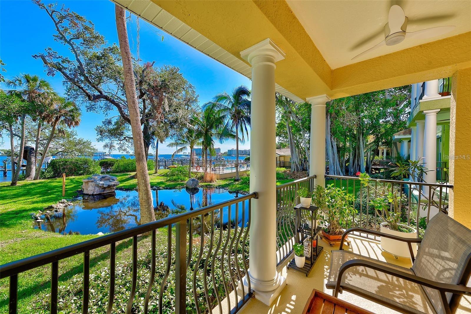 Waterfront Elegance in Banyan Bay—Now Upgraded Even Further! This rarely available Mediterranean-inspired townhome offers one of the best water views in the entire community, overlooking the pond, pool, and Little Bayou on Tampa Bay. Since purchasing, the owners have made major improvements, including two brand-new dual-zone A/C systems, a large expanded waterfront patio, and professionally engineered custom flood barriers for all first-floor exterior doors—adding peace of mind to a property that has never experienced water intrusion, even during recent hurricanes.Offering nearly 2,300 sq. ft. of refined living space, this 3-bedroom, 2.5-bath home with a flexible loft blends modern comfort with timeless Mediterranean style. The open kitchen flows into the dining and living areas, capturing sweeping water views through hurricane-rated windows and doors. Stainless steel appliances, granite counters, and a generous pantry complete the chef-friendly design.The newly enlarged patio provides a private outdoor oasis—ideal for entertaining, morning coffee, or enjoying sunsets across the bay and the glistening pool. Upstairs, soaring ceilings enhance the sense of space. The primary suite is a true retreat with tray ceilings, a spa-style ensuite with garden tub and walk-in shower, dual vanities, and a custom-built dressing closet. Two additional bedrooms—including one with a private balcony—offer versatility for guests, a home office, or hobbies. The loft adds another flexible space perfect for work or relaxation.Additional features include the new A/C systems, energy-efficient construction, hurricane-rated windows/doors, a durable tile roof, first-floor laundry, abundant storage, and an oversized garage.Banyan Bay is a private, gated community offering resort-style amenities including a waterfront pool, community dock perfect for fishing, and beautifully maintained grounds. The HOA provides low-maintenance living, covering insurance, exterior care, landscaping, cable, internet, water, sewer, trash, and more.Perfectly positioned along the shores of Tampa Bay, this home is minutes from vibrant downtown St. Petersburg, world-class beaches like Fort De Soto and Pass-a-Grille, St Pete Beach, and convenient access to Tampa. This is a rare opportunity to own an upgraded, move-in-ready waterfront residence in one of St. Pete’s most desirable gated communities. Schedule your private showing today!