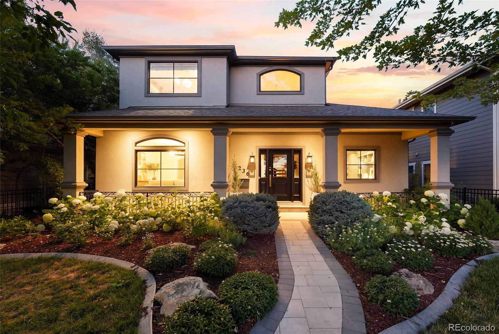 A rare study in craftsmanship and care, this custom Cory Merrill residence has seen over $400,000 in owner investment since 2021 — from solar and new HVAC to a full landscape transformation — layered atop a home already built for gracious living. High ceilings and glass French doors introduce a light-filled office; beyond, a formal living and dining room bring elegance to this traditional home. The designer kitchen — floor to ceiling cabinetry, diamond-tile backsplash, quartz throughout, Bosch appliances and a wine fridge — opens to a vaulted family room with a gas fireplace, built for gathering. Upstairs, the primary suite indulges with a mountain-view sitting room, custom closet, and a five-piece marble bath; two additional en-suite bedrooms complete the level, freshly carpeted in 2024. A finished lower level adds guest quarters, a large flex space, and custom built storage space. Outside features three distinct outdoor areas that create seamless indoor-outdoor living: A pergola-covered patio in the backyard perfect for lounging, a private courtyard with built-in grill great for outdoor dining, and front porch overlooking spectacular landscaping, tucked behind brand-new fencing. Plantation shutters, a floating staircase, Lutron smart lighting, and an oversized attached garage with custom built in storage and cabinetry complete this exceptional offering on one of the neighborhood's quietest streets.