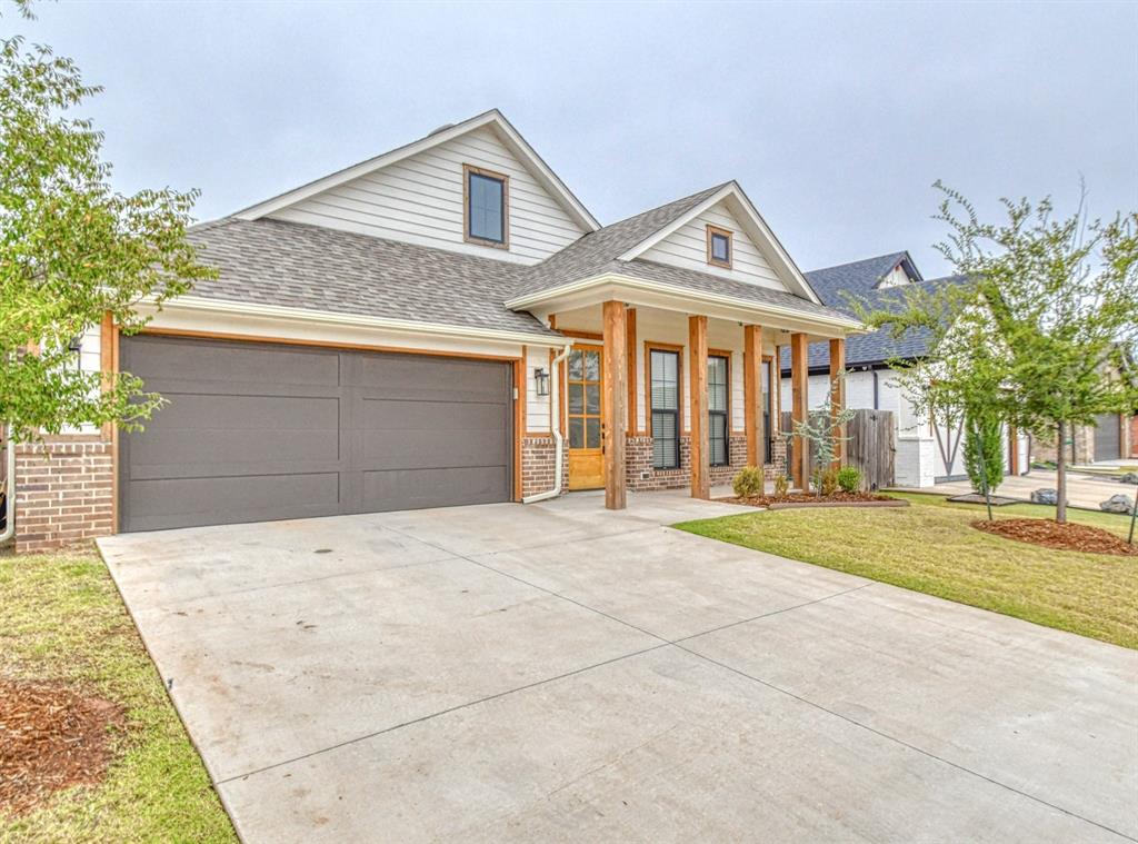 Welcome to The Springs at Valencia, a safe and quiet gated community in Edmond with amenities galore! This super sweet 2-bedroom home offers an open living/dining layout with lots of natural light and a cozy gas fireplace! The kitchen boasts stainless appliances with gas range, tastefully tiled backsplashes, quartz countertops and breakfast bar that overlooks the living area! The primary suite comes with a walk-in closet, double vanities, frame mirror, and large tile-surrounded stand-up shower! Enjoy the convenience of HOA covered landscaping and yard maintenance! Perks of living in the Springs include a neighborhood clubhouse, pool, and fitness center all on site! Edmond Schools. Owner licensed.