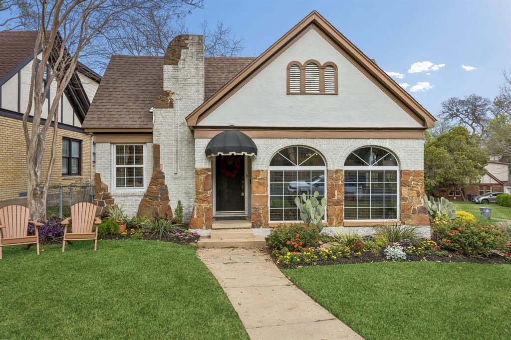 Timeless Tudor elegance in the heart of Hollywood Heights - Santa Monica. Feeds to coveted Lakewood Elementary. Perfectly positioned on a charming interior corner lot, this storybook bungalow showcases iconic architecture, beautifully curated landscaping, and undeniable curb appeal. Inside, the light-filled interior blends historic character with thoughtful updates, including an updated kitchen designed for modern living. The home offers two bedrooms, one and a half baths, and a bright flex space ideal for a home office, studio, or reading retreat. Arched windows and classic architectural details add warmth and charm throughout. Located just moments from White Rock Lake, neighborhood parks, and the vibrant East Dallas lifestyle along with feeding into Lakewood Elementary. This home offers a rare opportunity to own a true neighborhood gem.