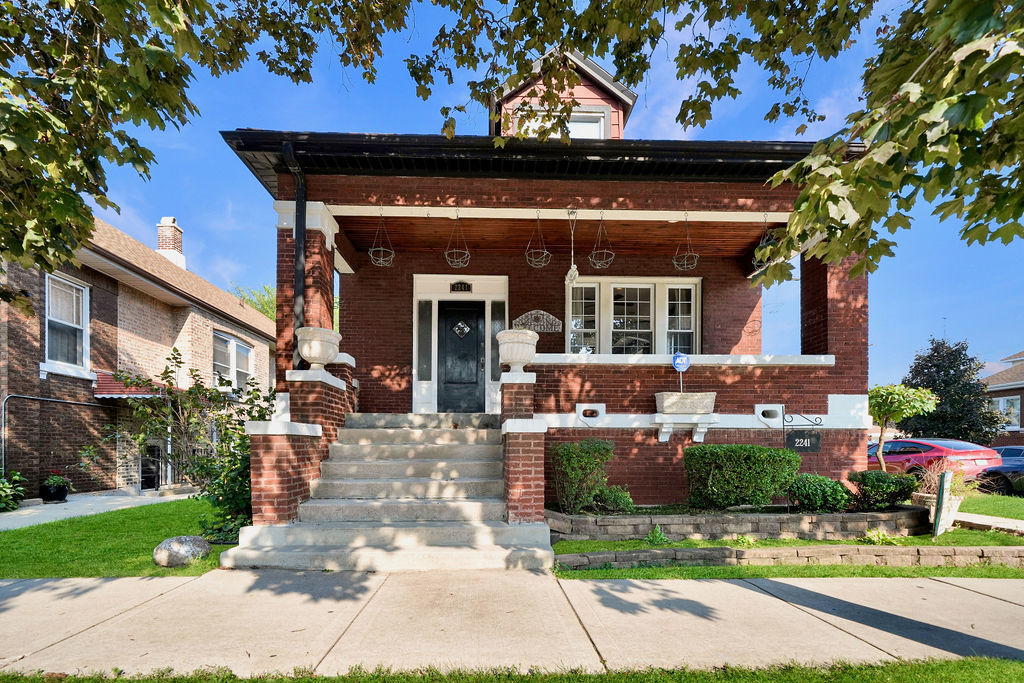 Remarkable quality-built brick bungalow situated on a desirable corner lot, offering an exceptional floor plan with abundant natural sunlight throughout. A tremendous front porch provides the perfect spot for summer enjoyment and welcomes you into a spacious foyer with a convenient coat closet.The first floor features an inviting open living room and dining room, three bedrooms, a full bathroom, and a spacious kitchen with an adjoining breakfast area. The fully finished attic adds even more living space and endless possibilities. Currently featuring a large great room, full bathroom, spacious bedroom, and plenty of closet and storage space, the attic can easily be customized to suit your needs.The finished basement provides an additional level of living space, beginning with a generous family room that leads to two additional bedrooms, one of which includes a full bathroom. With three levels of finished living space, this home offers an abundance of room for comfortable living, entertaining, guests, hobbies, and more.The fully fenced private backyard is ideal for outdoor enjoyment and features an above-ground pool, concrete patio, and a one-car brick garage.This truly unique property offers an impressive combination of space, features, and location. Conveniently situated within walking distance to schools, shopping, and transportation, this is an exceptional opportunity for anyone looking for a spacious and versatile home in a fantastic location.