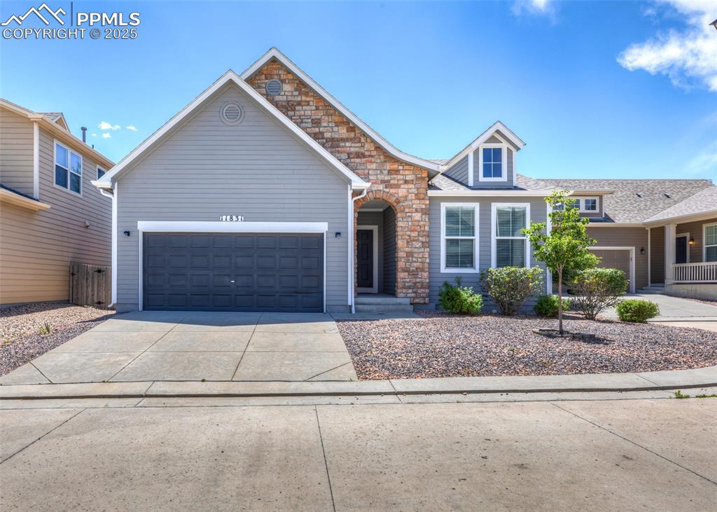 Welcome to this charming 3-bedroom, 2-bathroom ranch-style home located in the Courtyards at Woodmen Hills. Offering a bright, open layout with vaulted ceilings. The interior has been recently painted and includes beautifully updated bathrooms, all-new light fixtures, and ceiling fans in both the living room and primary suite. You’ll also find new door hardware throughout for a fresh, modern feel. The primary bedroom includes a private bath with double sink vanity and walk-in closet. The spacious living room opens to the kitchen and dining space providing plenty of room for entertaining. Two more good sized bedrooms, another full bathroom, and designated laundry space complete this main level home. Enjoy the fully landscaped yard filled with mature plants and bushes—perfect for outdoor relaxation. New roof in 2019, and central air conditioning for year-round comfort. Spacious attached 2-car garage. Residents enjoy access to the community rec center, complete with fitness facilities and pools. With a great location near Hwy 24 and Woodmen Rd, this move-in ready home offers comfort, convenience, and a great lifestyle.