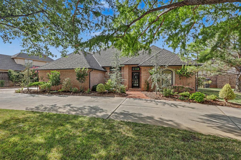 Situated on a beautifully landscaped lot with a large circle driveway, this charming home offers a functional layout, thoughtful finishes, and plenty of space for everyday living and entertaining. As you enter, large windows fill the room with natural light and immediately draw your eye to the beautifully landscaped backyard and inviting gunite swimming pool. The pool pump was replaced in July 2026. A bonus for the new Home Owner, A new roof will be installed prior to closing, along with touch-up paint around the skylights. Crown molding flows throughout the home, and plantation shutters are featured in most rooms. The spacious floor plan includes two living areas and two dining areas, with gas-log fireplaces in both living spaces. The kitchen offers an abundance of cabinet and countertop space, a pantry, stainless steel double ovens, a dishwasher, and instant hot water at the sink for added convenience. The refrigerator will remain with the property. Beautiful real wood flooring enhances the entry, kitchen, and breakfast area. The spacious primary bedroom includes private access to the patio and a luxurious en suite bathroom featuring double sinks, a dedicated makeup counter, jetted tub, walk-in shower, and an incredible walk-in closet with extensive built-in storage. Each secondary bedroom features a walk-in closet and its own private vanity and sink area, while the bedrooms share a connecting tub and shower combination—providing both privacy and convenience.The laundry room is equally impressive, offering a utility sink, folding counter, and abundant storage. Be sure to explore the garage, where you will find a large hidden storage and workshop closet. With flexible living spaces, abundant natural light, beautiful landscaping, and a backyard designed for relaxing and entertaining, this home has so much to offer!