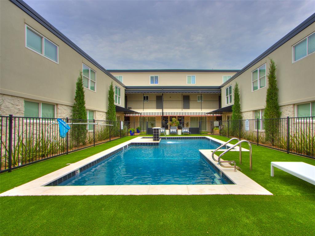 Summer starts here! Stunning Modern Condo in the Heart of Nichols Hills! Experience low-maintenance living in this beautifully renovated condo located in one of Oklahoma City's most desirable areas. Completely remodeled down to the studs, this exceptional home offers modern finishes, thoughtful updates, and an unbeatable location.The open-concept living and dining area is filled with natural light and opens to a private balcony with views of Downtown Oklahoma City and the Devon Tower. The renovated kitchen features quartz countertops, custom cabinetry, stainless steel appliances, and a refrigerator that remains with the property.Upstairs, you'll find two spacious bedrooms and two full bathrooms. The primary suite includes two walk-in closets and a beautifully updated en suite bathroom. An upstairs laundry area adds convenience and functionality.Major updates include a newer HVAC, plumbing, electrical, flooring, kitchen, bathrooms, fixtures, and finishes throughout. Covered parking is provided under the carport.Residents enjoy access to a recently updated community pool featuring modern landscaping, turf, and a gazebo area for entertaining. The HOA covers water, trash service, pool maintenance, grounds maintenance, and partial insurance.Ideally situated within walking distance of Trader Joe's, Starbucks, Empire Slice House, and the Grand Boulevard trails, with Whole Foods, Classen Curve, and additional shopping and dining just minutes away. This move-in-ready condo offers an exceptional opportunity to enjoy modern living in the heart of Nichols Hills.
