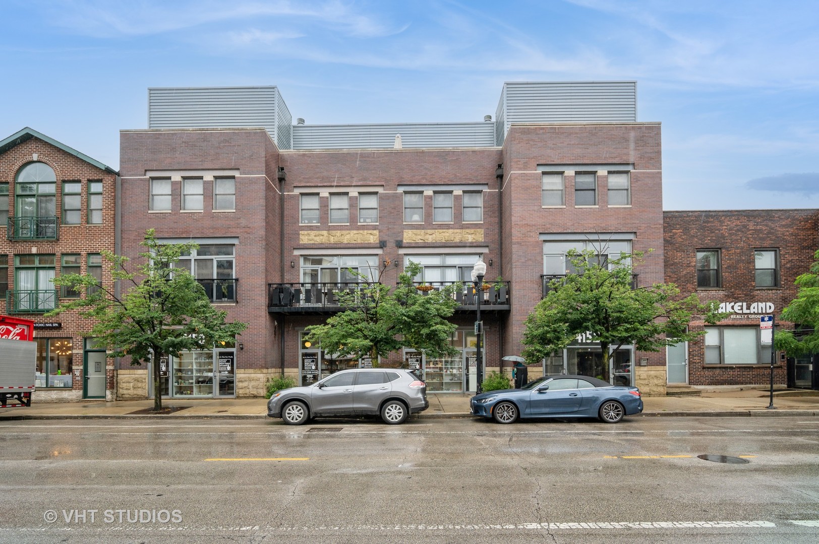 Welcome to this beautifully updated 3-bedroom, 2.1-bathroom triplex in the heart of highly desirable North Center that quite simply exudes modern elegance. Located in the coveted Coonley school district and just steps from the Brown Line El, Ravenswood Metra, and neighborhood favorites, this spacious home combines stylish design with everyday functionality. The chef's kitchen is a showstopper, featuring sleek granite countertops, modern white cabinetry, a double sink, pantry, and stainless steel appliances (2020)-this kitchen is perfect for both cooking and entertaining. Soaring 12-foot ceilings and rich hardwood floors define the expansive living room, complete with a custom stone gas fireplace, built-in dining nook, and a walk-out balcony for al fresco mornings or evening unwind time. Retreat to the luxurious primary suite, offering two generous closets and a newly updated designer, custom spa-like ensuite bath which was fully renovated in 2023. The bath features double sinks and a stunning large shower with beautiful herringbone floor tiles complimented by  blue wall tile detail with built-in shelving and a bench creating a lavish retreat . Upstairs, you'll find an oversized second bedroom with an amazing skylight with a built-in shade so you can enjoy light and dark at your whim.  The third floor provides versatility with a den/third bedroom, access to a full bath with a soaker tub and another private deck-ideal for guests, a home office, or creative space.  This home has no shortage of storage space with ample, custom closets on every level.  This secluded rear facing condo truly lives like a single family home in the heart of this incredible North Center neighborhood. Additional highlights include in-unit laundry, a garage space with additional storage, and recent updates throughout.  Enjoy worry free living with 2019 dual zoned HVAC, 2018 HWH and a self managed building with low assessments-just move in and enjoy!  This is city living at its finest-don't miss your opportunity to call this North Center gem home.