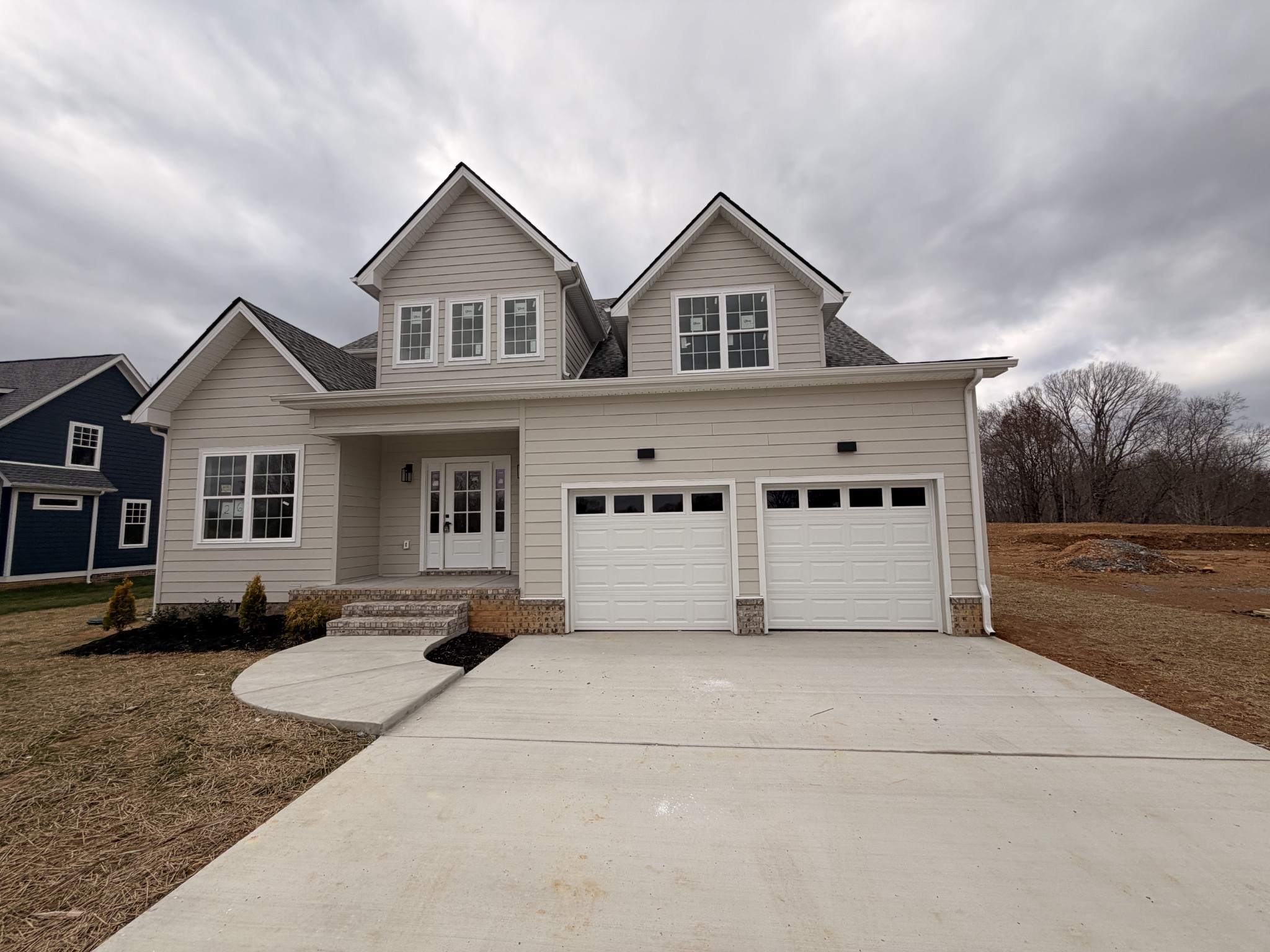 Welcome to this charming home in Eagles Ridge Subdivision, conveniently located just outside of Nashville. Inside, you'll find beautiful real hardwood floors that add warmth and character throughout the home. The stunning tile work and thoughtfully designed layout create both style and functionality, making everyday living comfortable and inviting. With its elegant charm and great location, this home offers perfect blend of conveinece and timeless appeal.