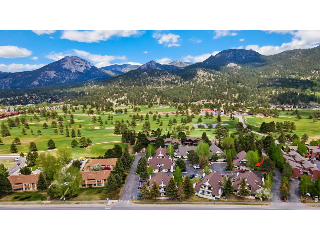 Looking for an immaculately maintained, main-level condo? Welcome to easy living at Eagles Landing! This charming, move-in-ready 2-bedroom, 1-bath condo offers the ease of single-level living in one of Estes Park's most desirable locations. Step inside to an open living and dining area with vaulted ceilings, a cozy gas fireplace, and loads of natural light. A large sliding door opens to your own private fenced patio, providing a great place to relax and enjoy the Estes Park setting.The spacious primary bedroom features a walk-in closet and convenient pocket-door access to the full bathroom. Additional highlights include a rare forced-air heating system for condos in Eagles Landing, along with a new water heater. Enjoy a convenient and quiet location with a dedicated parking space right outside the unit and plenty of guest parking. Experience the best of Estes Park living with easy access to the 18-hole Estes Park Golf Course, walking and biking trails, Estes Valley Community Recreation Center, and majestic Rocky Mountain National Park-all just steps from your door or minutes away. Charming downtown restaurants, unique shops and entertainment venues are also just minutes away. Whether you're looking for a low-maintenance full-time residence, weekend mountain getaway, vacation retreat, or investment opportunity, this Eagles Landing condo offers exceptional value in Estes Park. No short-term rentals; 30-day-plus rentals are permitted.