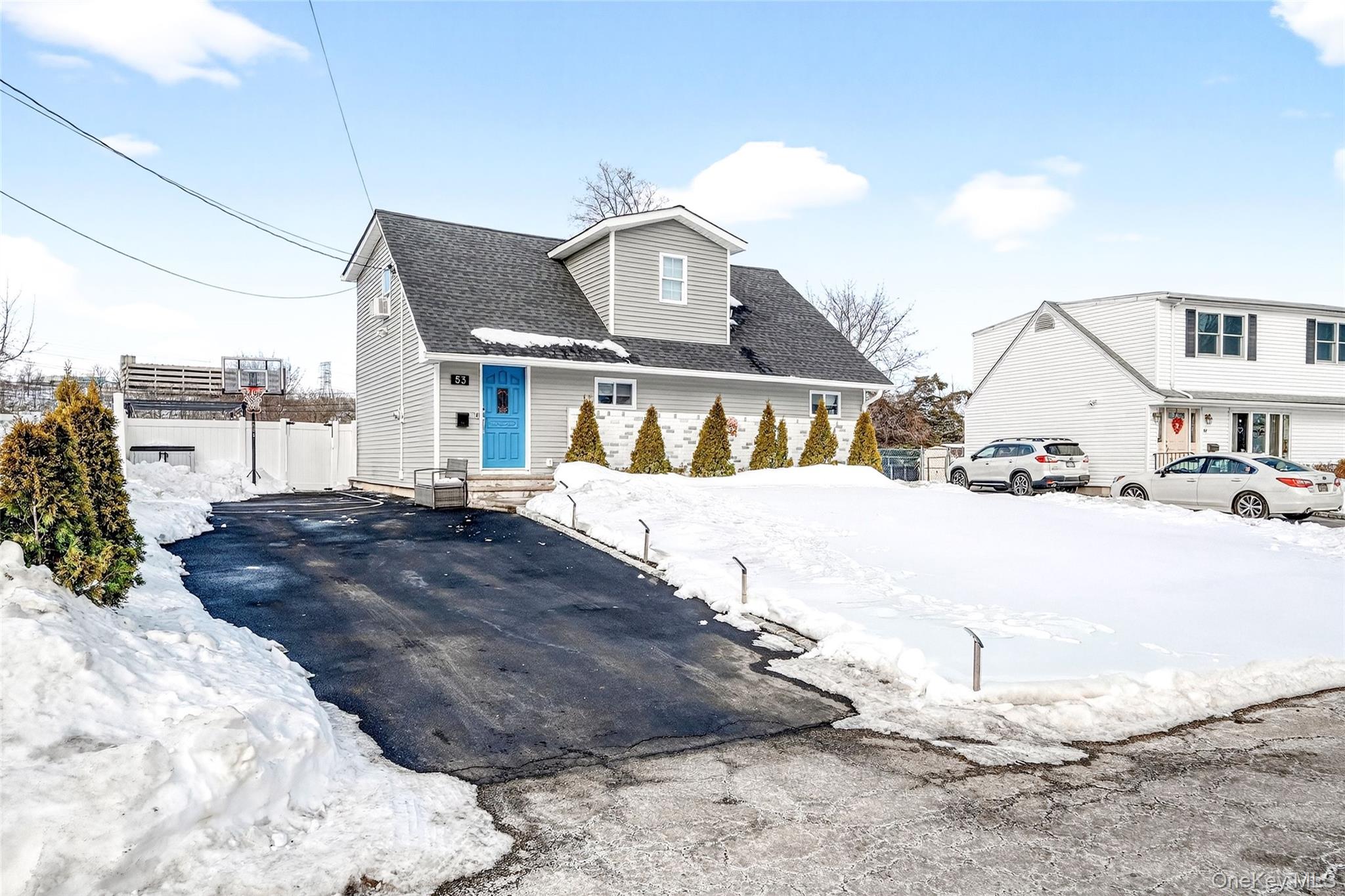 Welcome to 53 Hazelton Road, a beautifully updated 4 bedroom, 2 bath Cape Cod in the peaceful Westview neighborhood of Yonkers. Set on a generously sized lot, this home blends classic charm with modern upgrades and space to truly live. The fully renovated kitchen is a standout feature, designed in a striking two tone palette with crisp white upper cabinetry and rich navy blue lower cabinets. Completely open to the main living area, it offers seamless flow for everyday living and entertaining. A massive center island anchors the space, perfect for gathering, meal prep, or morning coffee. Brand new stainless steel appliances complete the look with style and function. Natural light pours into the inviting living room, highlighting the floors and thoughtful updates throughout. The main level includes two comfortable bedrooms and a full bath. Upstairs, you will find two spacious additional bedrooms ideal for guests, a home office, or creative space. The full unfinished basement provides excellent storage, laundry space, and future potential. Step outside to an expansive yard that truly sets this home apart. With plenty of room to entertain, garden, play, or relax, plus a large storage shed, this outdoor space is ready for summer barbecues and year round enjoyment. A private driveway fits all vehicles, and the location offers easy access to shopping, parks, schools, major roadways, and public transportation. 53 Hazelton Road delivers space, style, and convenience all in one inviting package.