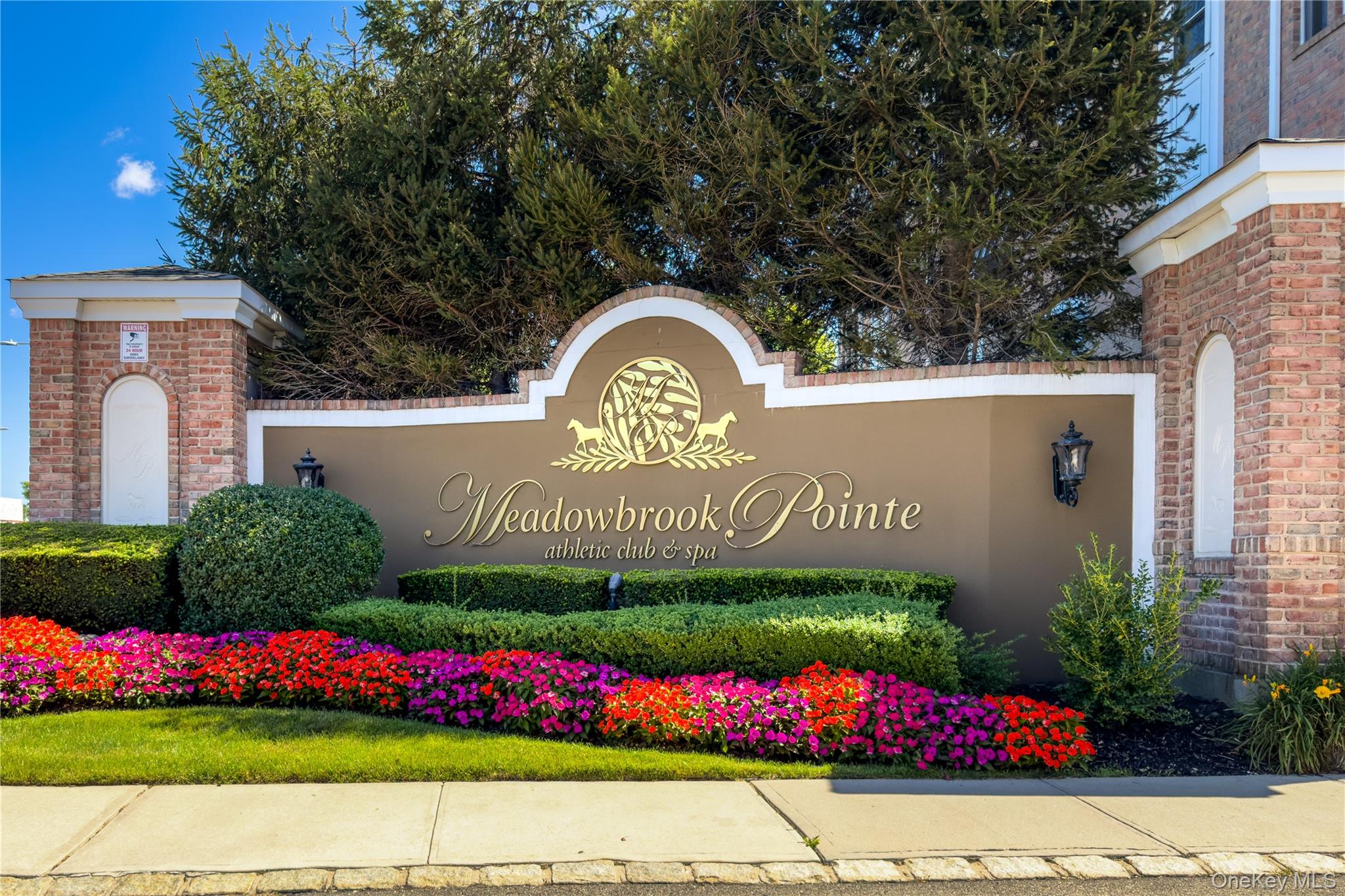 This elegant Fairmount model corner unit boasts two spacious bedrooms with a walk-in closet, two bathrooms, crown molding and tray ceiling, Hardwood floors throughout, Gourmet eating kitchen with stainless steel Appliances, The open floor plan is perfect for entertaining and comfortable every day living. The Middlebrook Athletic Club and Spa, built by the award-winning Beechwood Homes, offers luxurious resort-style living for active adults 45+ in a gated community. The recently renovated 25,000 sq. ft. clubhouse features a state-of-the-art gym, locker rooms, sauna, movie theater, game and card room, library, indoor/outdoor pools, a beautiful patio with a barbecue area, caf&#233;, and elegant ballroom, perfect for socializing. Residents can enjoy various activities, including fitness classes, live music, special events, and lectures. The complex is conveniently located near the Meadowbrook Parkway, Whole Foods, Trader Joe's, Target, Costco, Eisenhower Park golf course, and offers easy access to JFK and LaGuardia airports. Security includes a 24-hour staffed gatehouse and roving patrols. The HOA fee covers clubhouse membership, water, sewer, and gas.