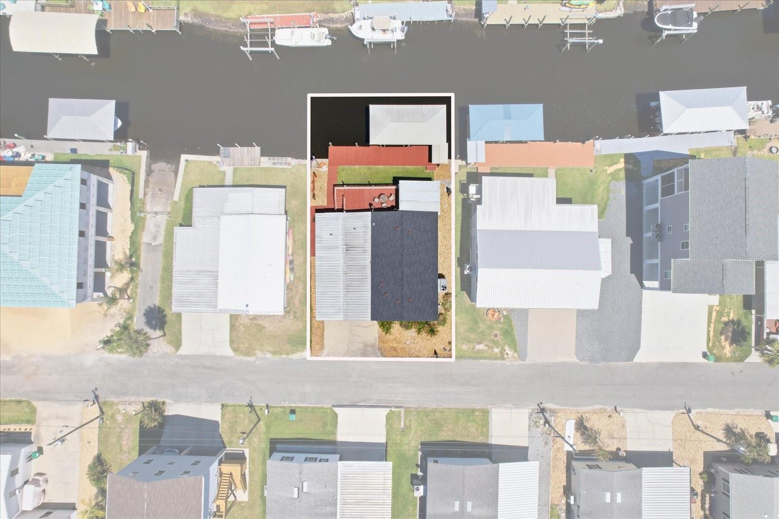 Seller is offering a $12,000 credit to assist with closing costs, prepaids, or buying down points with full price contract. Discover this beautifully situated 2-bedroom, 2-bath home in a desirable golf cart-friendly community in Homosassa. This waterfront property offers its own dock and covered boat lift with quick access to the river and out to the Gulf of Mexico, great for boating and fishing along Florida’s Nature Coast. Step inside to a bright and spacious living area designed for both entertaining and everyday comfort. After a day on the water, unwind while taking in tranquil water views and coastal breezes. The home also includes a covered carport and an inviting patio space, for enjoying peaceful surroundings and sunset views. Local favorites like The Freezer Tiki Bar and The Shed at MacRae’s are approximately half a mile away, adding to the convenience and lifestyle this location. This property is an unbeatable waterfront location with direct access to everything Homosassa has, combining comfort, convenience, and a true coastal lifestyle.