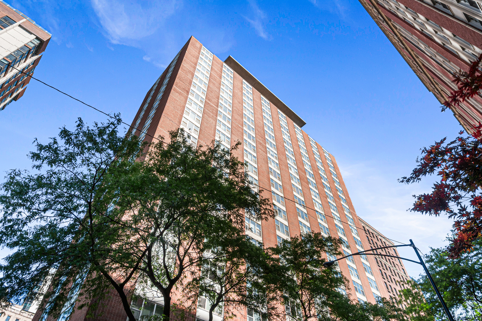Sun-filled and beautifully updated, this oversized one-bedroom sits in the heart of the Gold Coast - one of Chicago's most walkable, well-loved neighborhoods. Inside, an enormous combined living and dining room gives you real room to live, while the king-sized bedroom holds a full suite of furniture with closets to spare. The refreshed kitchen features marble countertops, a stainless refrigerator, fresh tile flooring, a stylish backsplash, modern lighting, a walk-in pantry, and an expanded doorway that opens it to the dining area. The renovated bath includes an accessible walk-in shower with full-body spray. Wood laminate floors run throughout, and recent improvements - new shades with blackout in the bedroom, an upgraded electrical panel, and a smart thermostat - make this one truly move-in ready. The full-amenity building has been well cared for, with new plumbing risers, facade repairs, and new air handlers already complete and redesigned hallways arriving in 2026. Residents enjoy 24-hour door staff, an outdoor pool, a renovated sundeck, on-site management and engineering, a bike room, additional storage, and valet. On-site garage parking is available at just $175/month, with EV charging and car-wash service. The monthly assessment covers heat, air conditioning, water, cable, internet, and wi-fi. Step outside to Rush Street's restaurants and nightlife, Mariano Park, and the Magnificent Mile. Oak Street Beach, Lincoln Park, and the lakefront trails are an easy stroll, and the Clark/Division Red Line keeps the whole city within reach. Pet-friendly and rental-friendly, a rare mix of space, location, and value.