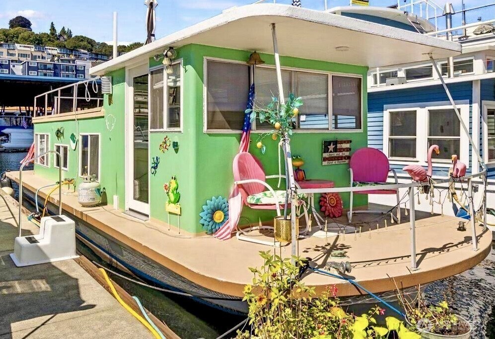 Welcome to Sunny!  Completely-remodeled fully-furnished houseboat w/ every amenity & loads of natural light.  Roof and all decks recently resurfaced. Enter to a lofted seating area w/ Lake & City views leading to the fully-updated kitchen w/ dining space & cozy fireplace. New efficient appliances, countertops & flooring. Bright bedroom includes new ensuite laundry & full bath w/ tasteful marble-finish & soaking tub. Plenty of outdoor space--2 lower decks & a full roof deck, all new fiberglass w/ wide views of Lake Union, Gasworks & Downtown. Burke-Gilman Trail outside your door takes you to 7 neighborhoods as well as many large employers like Microsoft, Facebook, Google and Biotech. Moorage of $1200 includes water/garbage. Free parking. Hauled-out & bottom-painted 9/23. Pets allowed, City-registered FOWR 715.