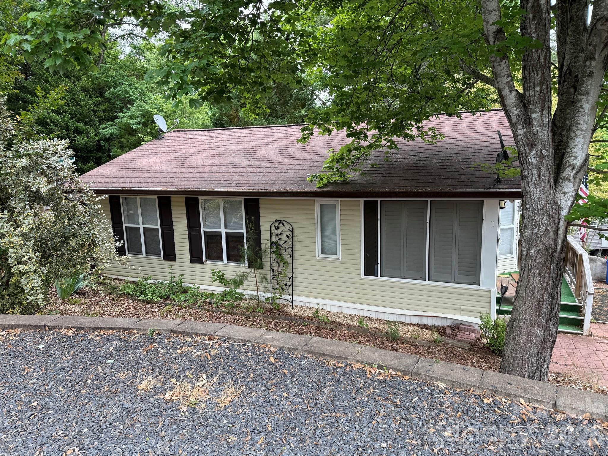 Who is looking for a place that needs work but has great bones??  This could be the one. Park Model with an addition. Additional common area was bought and added to this lot making is larger than most. 1 Bedroom and 1 bathroom. All electric unit with washer dryer to remain. New metal roof will be installed in the next 2 weeks. There has been a roof leak in the bathroom. The wall behind the shower needs to be replaced. What is there will remain. Come and make this little home into exactly what you want it to be.  All buyers must be with a realtor to gain access to the community.