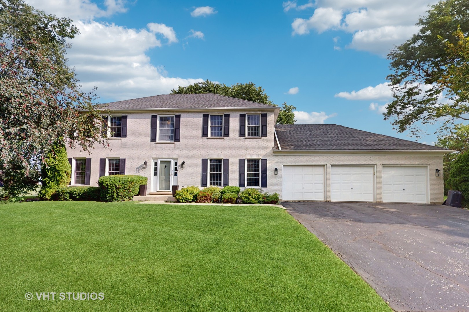 Don't miss out on this opportunity to experience all the benefits of an exceptional home in highly sought after Sleepy Hollow! This stately two story home situated on just under a 3/4 acre corner lot includes over 2600 sft of upper living space + an additional 1300 sft of lower level space! From the moment you enter the spacious foyer with formal living room to the left and formal dining room to the right, you will feel at home! The first floor includes engineered hardwood throughout! Chair rail and ceiling molding and built-ins add a touch of class! The family room with wet bar, fireplace and sliding door to the patio is the perfect place to unwind, relax, and entertain! Adjacent to the family room is the spacious eat-in kitchen with center-island, butler pantry, additional pantry cabinet with pull-outs! Quartz counters! All appliances stay! Easy access to patio from the kitchen through the sliding doors! The utility room is oversized and includes a fabulous walk-in pantry + exterior access to the rear yard! The second level features 4 bedrooms and two full baths! The oversized master bedroom suite is awesome, with room for an office, or exercise area, or so many other possibilities! It includes a large walk-in closet and bath! The views will make you want to spend all your time here! The other 3 bedrooms are spacious, and two include nice sized walk-in closets! The hall bath has been updated and includes a whirlpool tub and double sink! All bedrooms include ceiling fans! The full basement provides endless possibilities for an additional family room, rec room, exercise room, office, or possibly a 5th bedroom! All exercise equipment stays! The yard is the perfect place for family or friend gathering and entertaining! Large concrete patio! Lush landscaping and large trees add to the beauty and serene nature of this amazing property! Attached 3 car (or toys) garage with built-in cabinetry and additional storage closet! This property is being sold "as-is". Hurry, before it's too late!