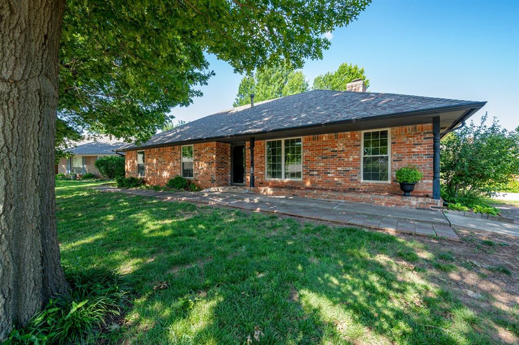 Tucked away in a cul-de-sac and situated on nearly half an acre, this beautifully updated home offers space, comfort, and convenience in a prime location. Recent upgrades include luxury plank flooring (2025), granite and marble countertops (2025), modern LED lighting (2025), a new Rheem hot water heater (May 2025), Trane furnace (2020), Rheem A/C unit (2019), and a roof replaced in 2020. This home features a smart thermostat, Wyze Bluetooth lock, and a storm shelter in the garage for peace of mind. Both formal living and dining areas, while the main living room boasts a floor-to-ceiling fireplace with a built-in bookcase. The gorgeous kitchen is equipped with new stainless steel appliances (2025), beautiful backsplash, and an eat-in dining area. Step outside to enjoy a covered patio, spacious fully fenced backyard, and a storage shed. The extended driveway offers ample space for RV parking. Located near Hafer Park, Spring Creek Trail, the upcoming Uncommon Ground Park, Bickham-Rudkin Dog Park, Pelican Bay Aquatic Center, and Lake Arcadia—with the Oklahoma Museum District just 15 minutes away—this home blends modern comfort with unbeatable access to outdoor recreation and local attractions. Don't miss your chance to see it—schedule your private tour today!