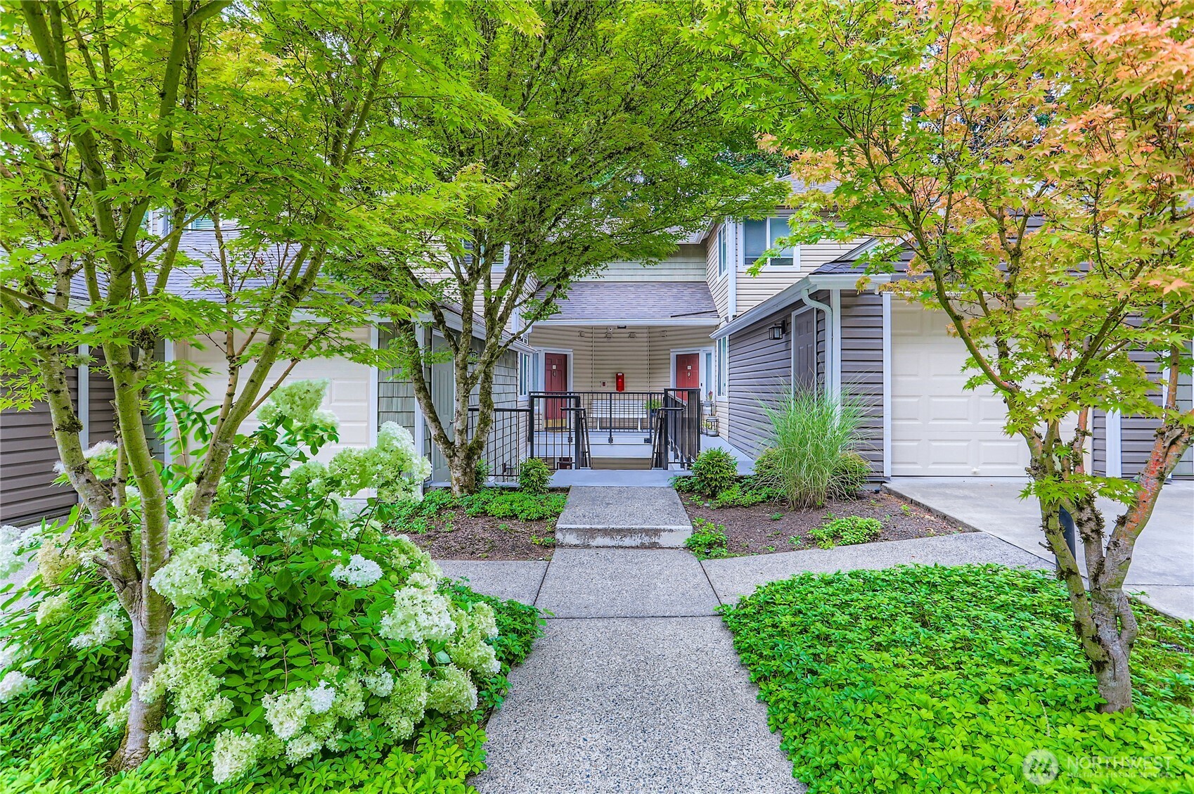 Discover comfort and tranquility in this charming 1-bedroom, 1-bathroom ground-floor condo in beautiful Issaquah. Tucked away and surrounded by lush trees, this home offers a sense of peace and privacy. Step outside to an overlooking private patio—perfect for coffee or winding down.Inside, is a relaxed open layout where the living area stays naturally cool in the summer, while the gas fireplace adds warmth during the colder months. It’s a space that feels like home year-round.Additional features include outdoor storage and one covered parking space. Whether you’re looking for a quiet retreat or a low-maintenance home in a scenic setting, this condo is a hidden gem you won’t want to miss. Easy access to I-90, shopping center and parks.